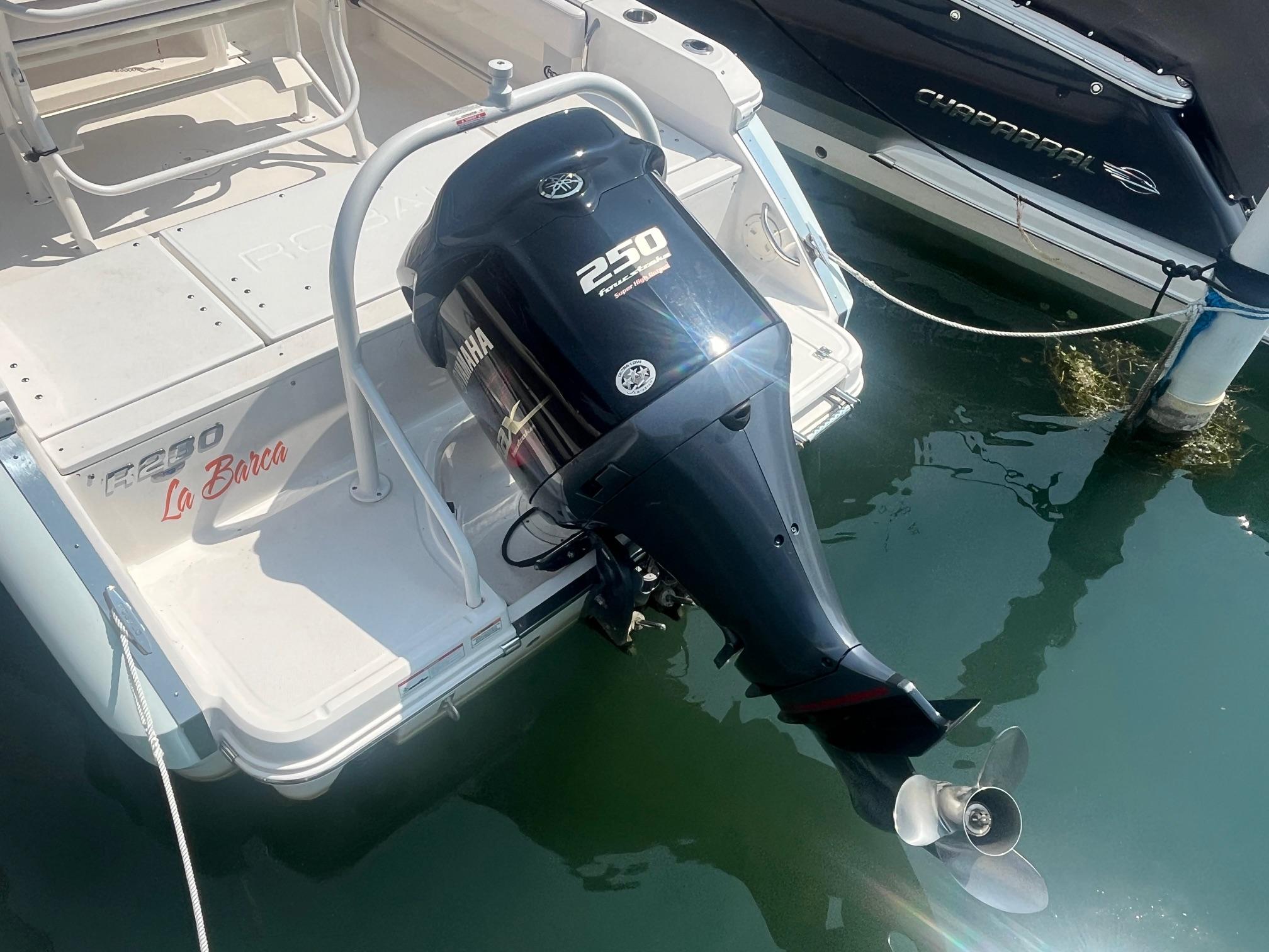 2020 Robalo R230 Center Console with Yamaha 250 outboard motor, docked in marina.