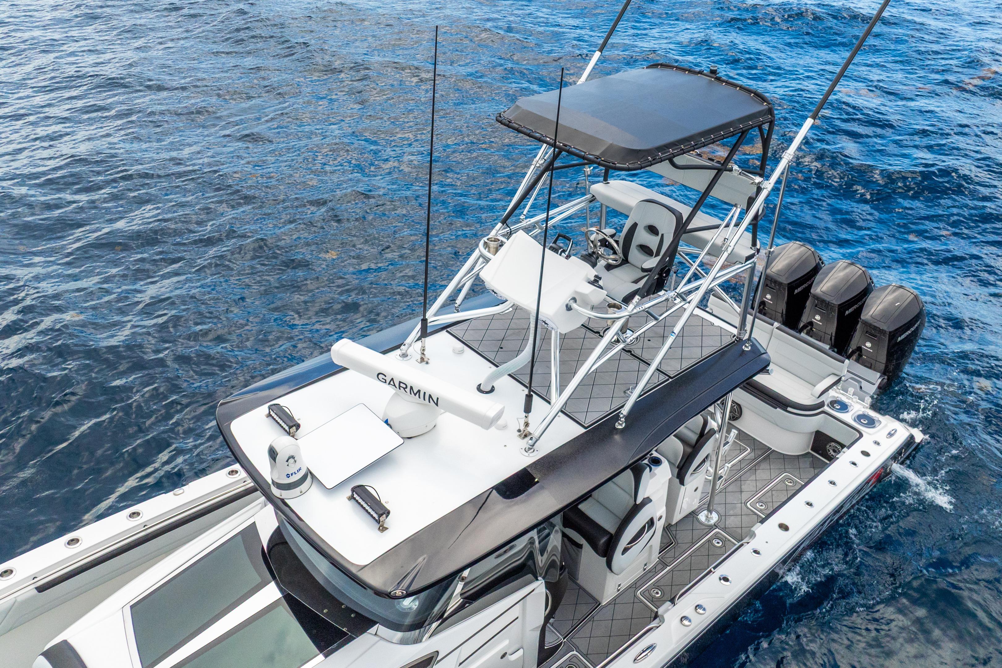 2024 Nor-Tech 452 Super Fish boat on open water, featuring advanced navigation equipment.