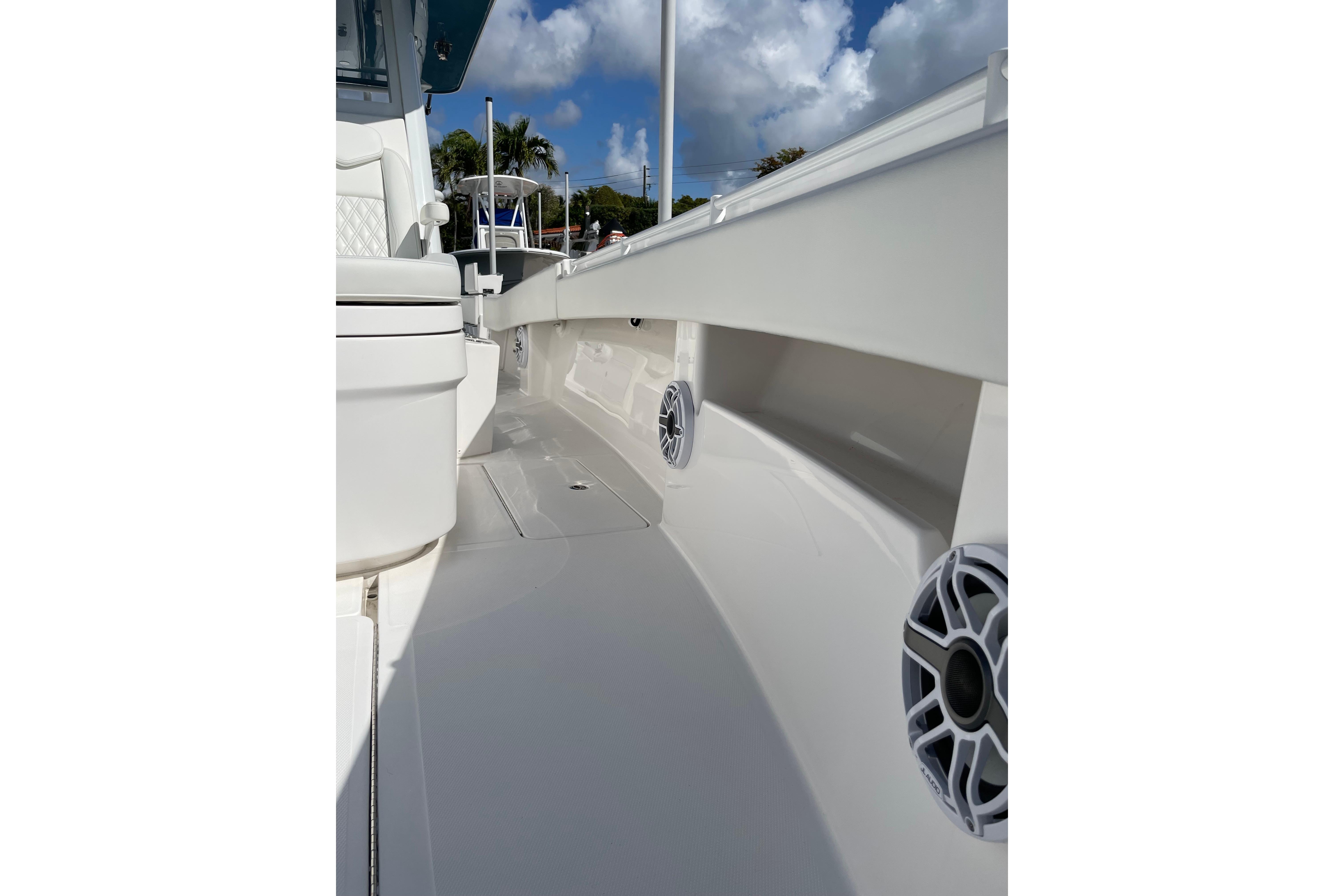 2024 Invincible 36 Open Fisherman boat deck with speakers and seating.