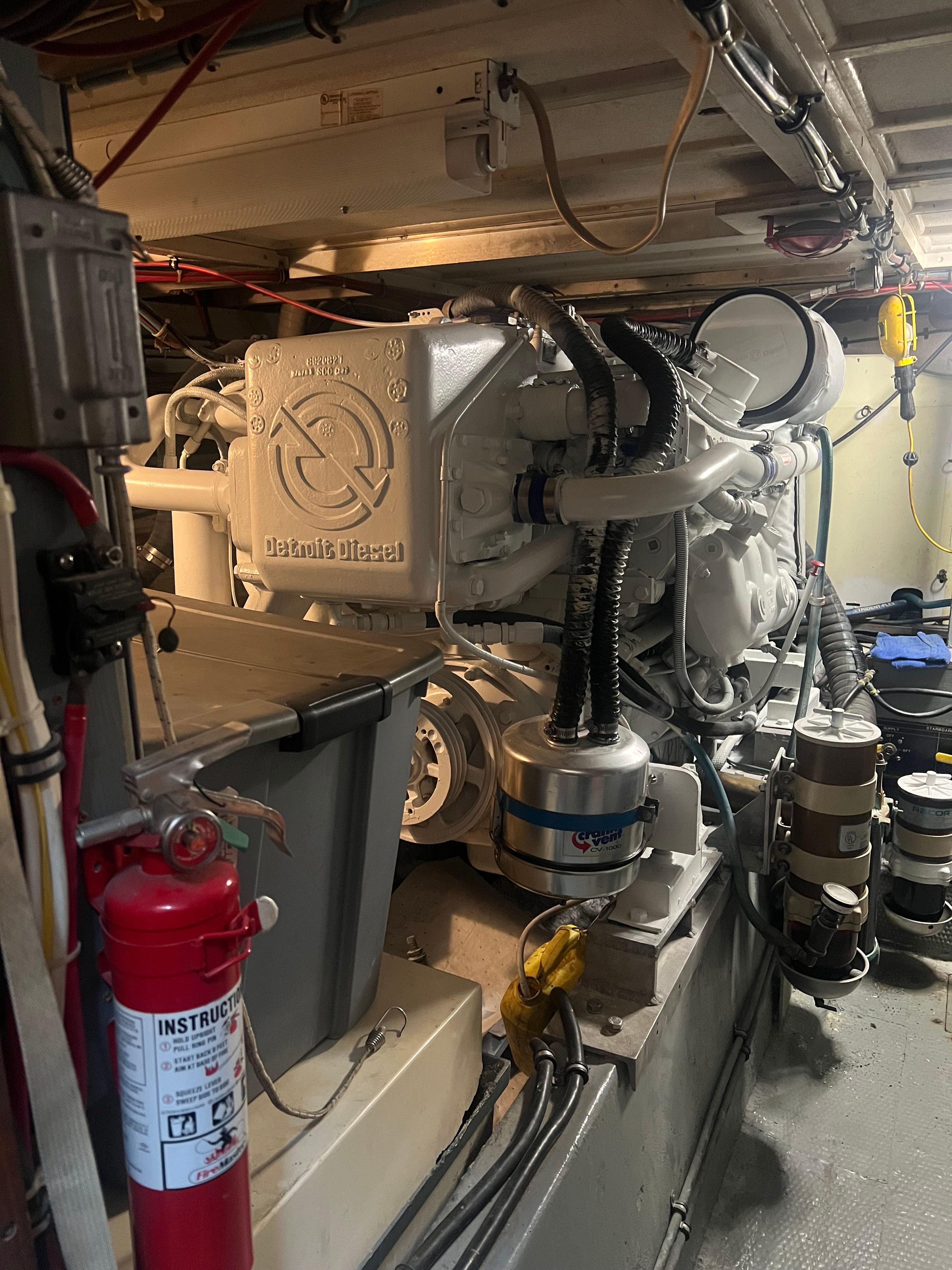 Engine room of a 1981 Hatteras Motoryacht with Detroit Diesel engine.
