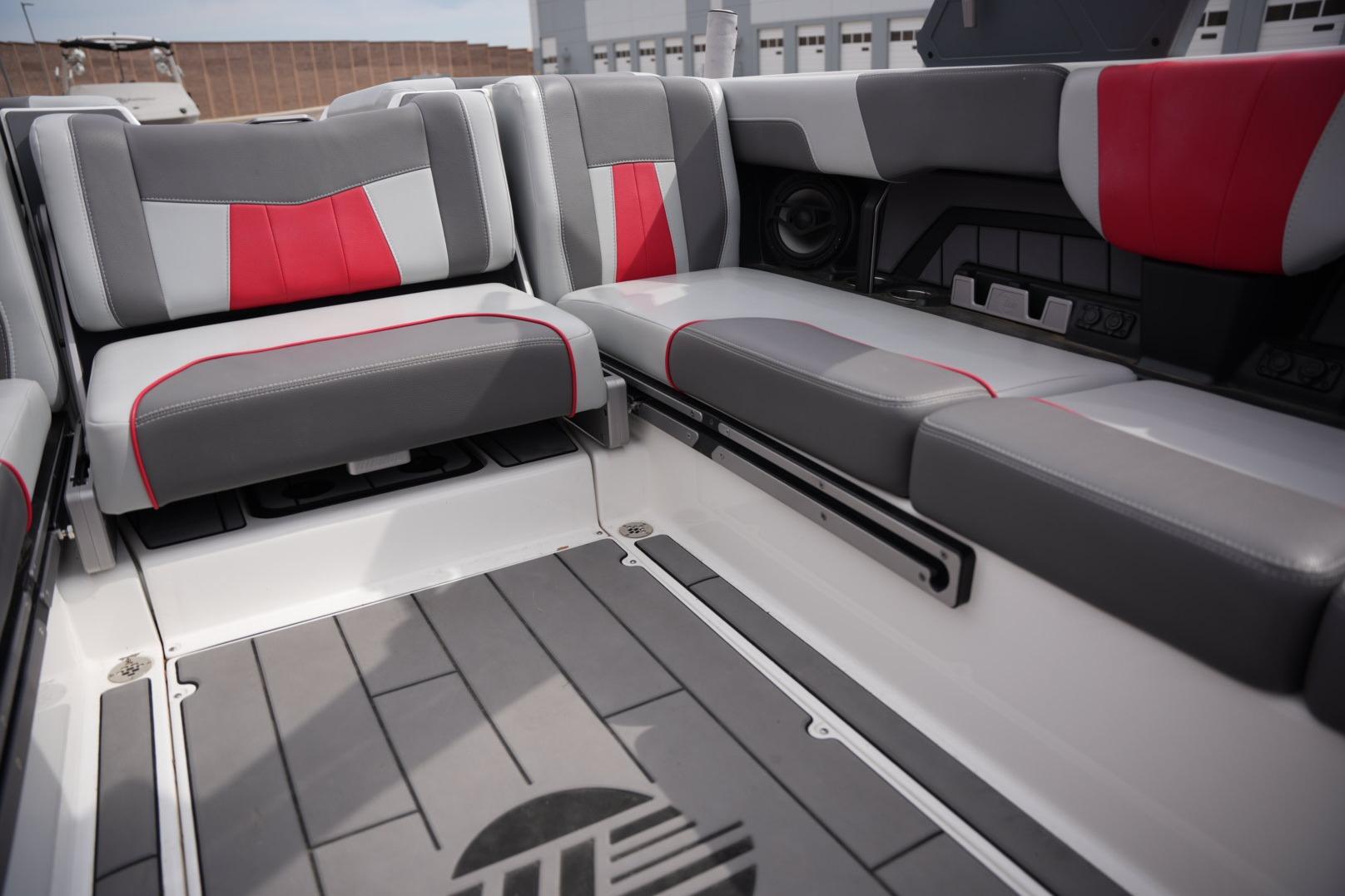 2022 Malibu Wakesetter 23 MXZ interior with gray and red seating.