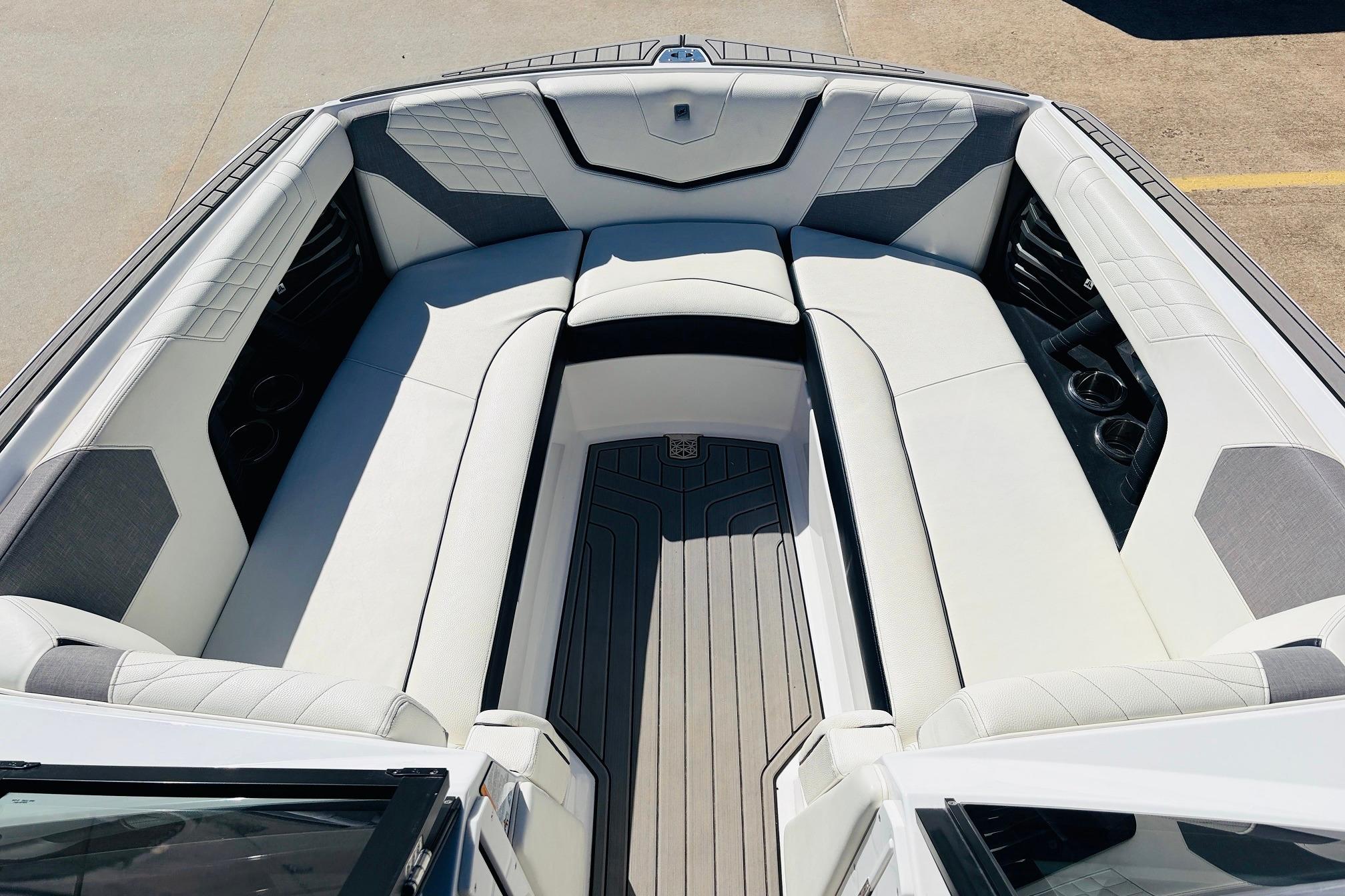 2023 Nautique Super Air Nautique G25 boat interior with luxurious seating and modern design.