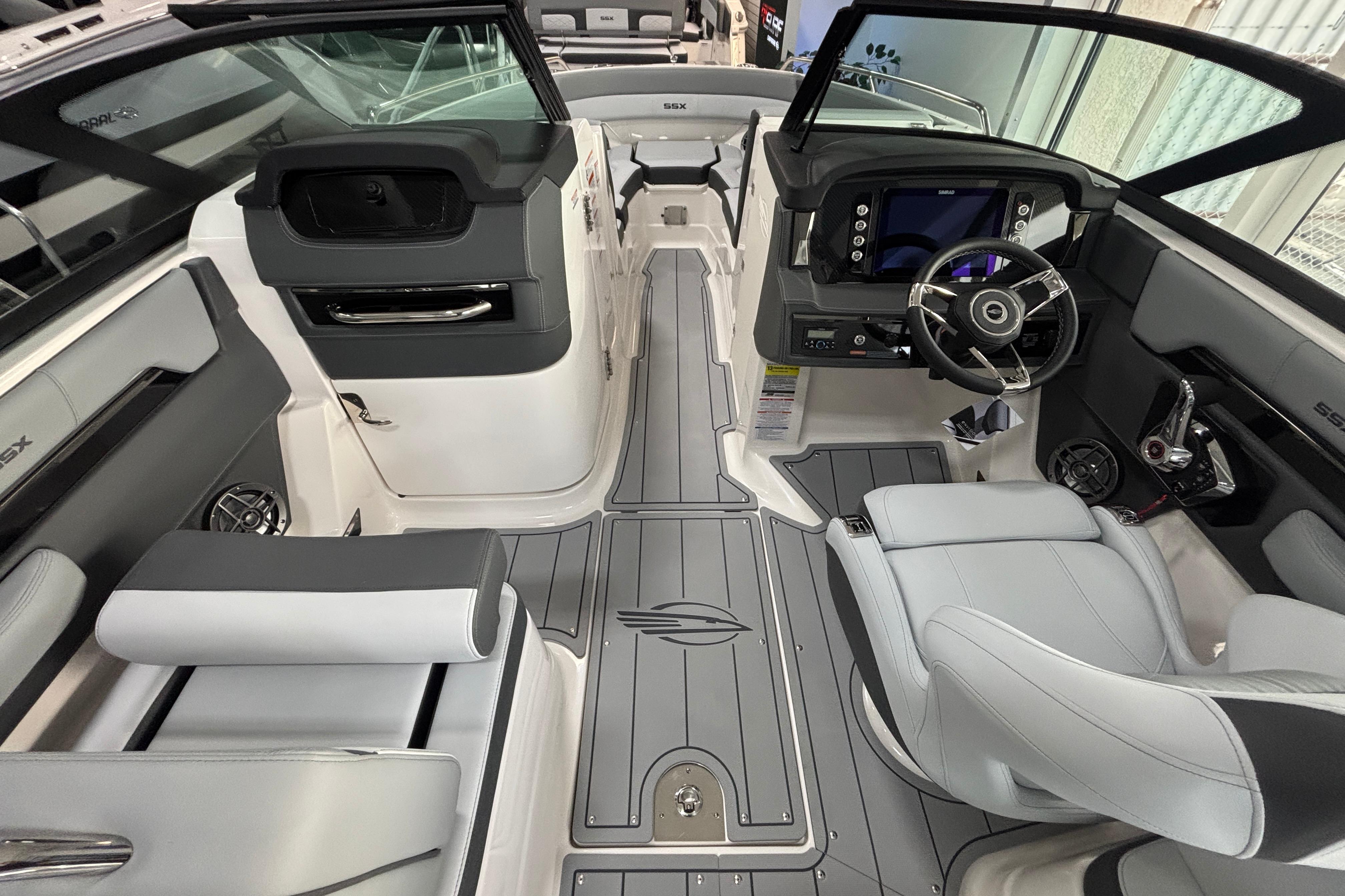 2026 Chaparral SSX 4 boat interior with modern dashboard and sleek seating design.