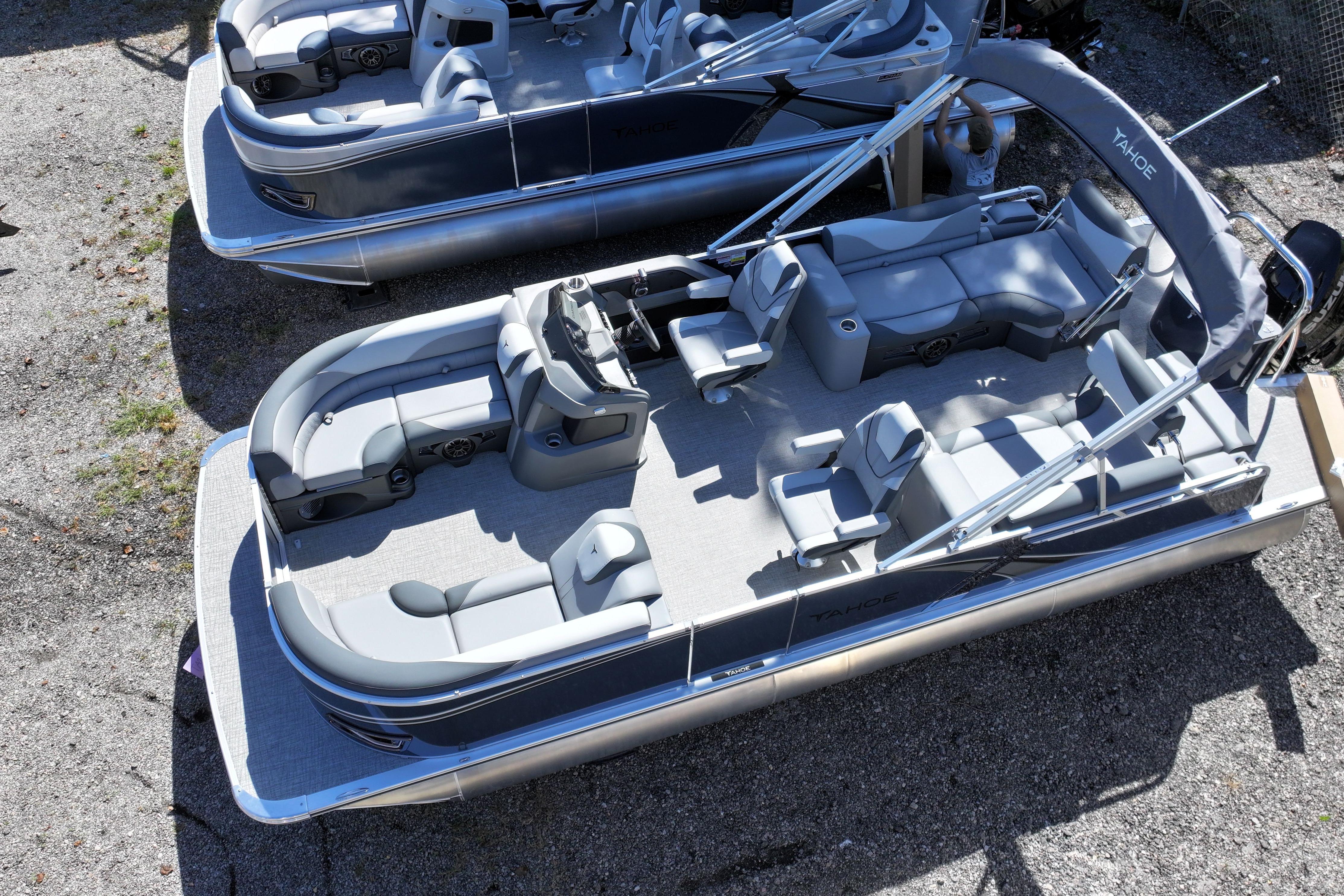 2026 Tahoe Pontoon LTZ Quad Lounger, luxury boat with spacious seating and sleek design.