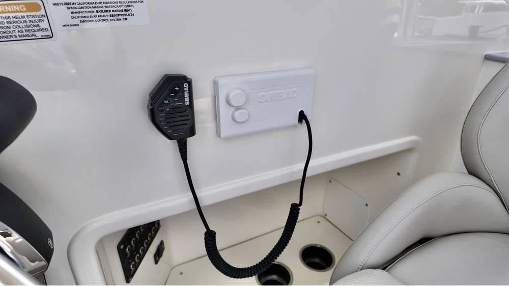 2025 Bayliner TROPHY 25 EXPLORER interior with radio microphone and control panel.