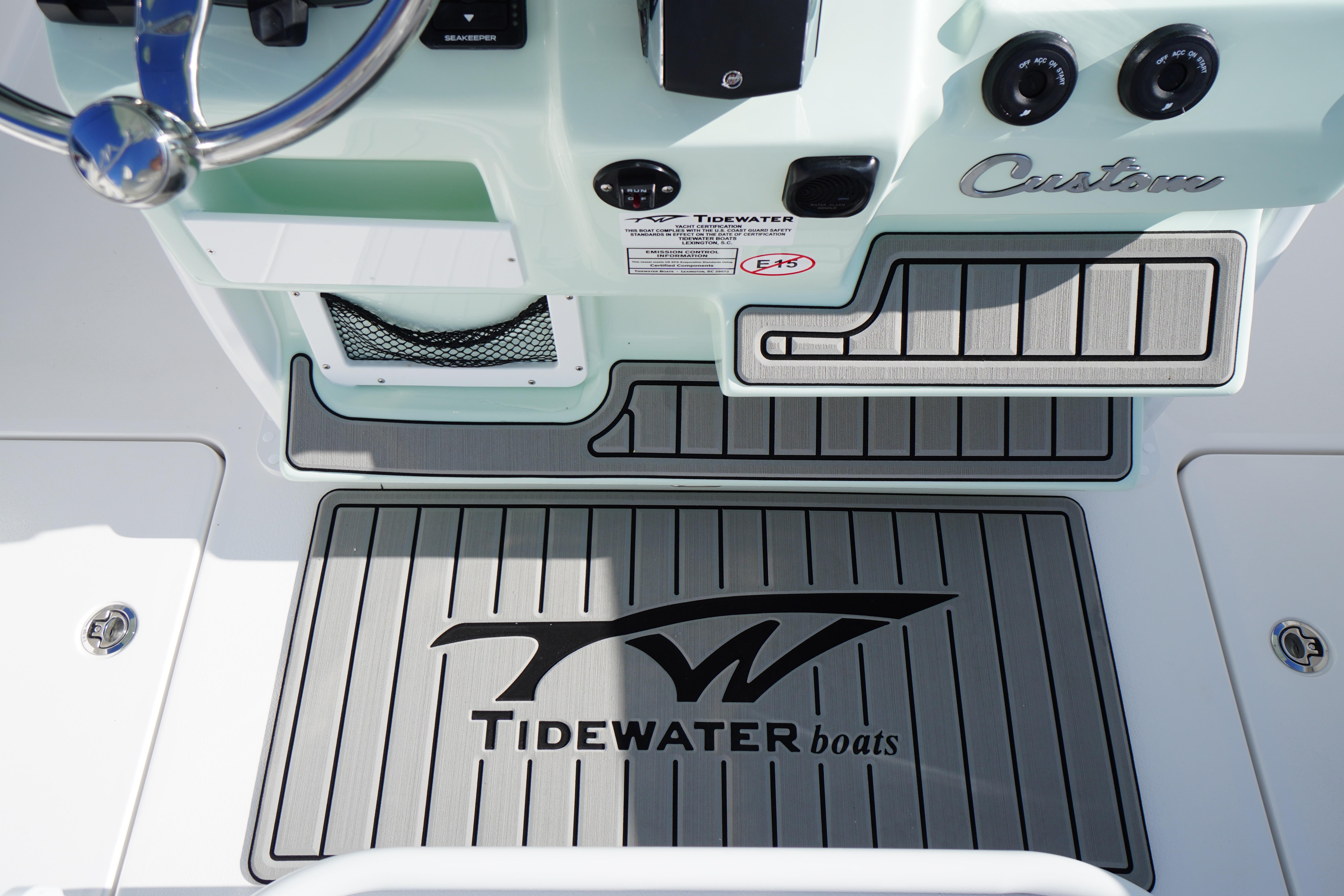 Tidewater 272 LXF 2026 boat dashboard with custom design and logo mat.