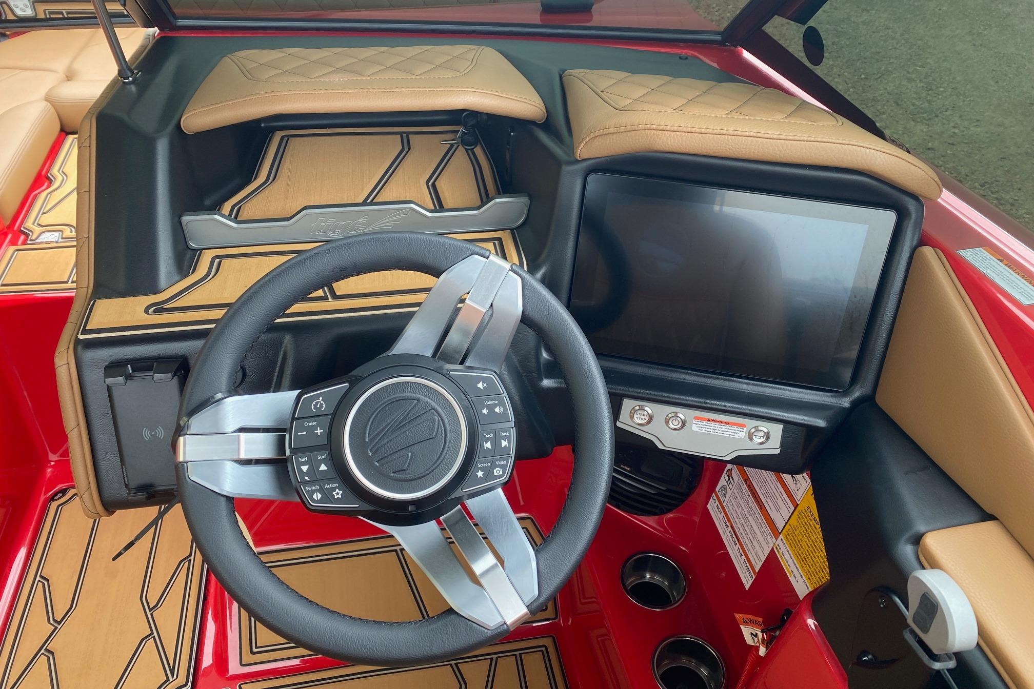 2026 Tigé Z3 boat dashboard with touchscreen and modern steering wheel design.