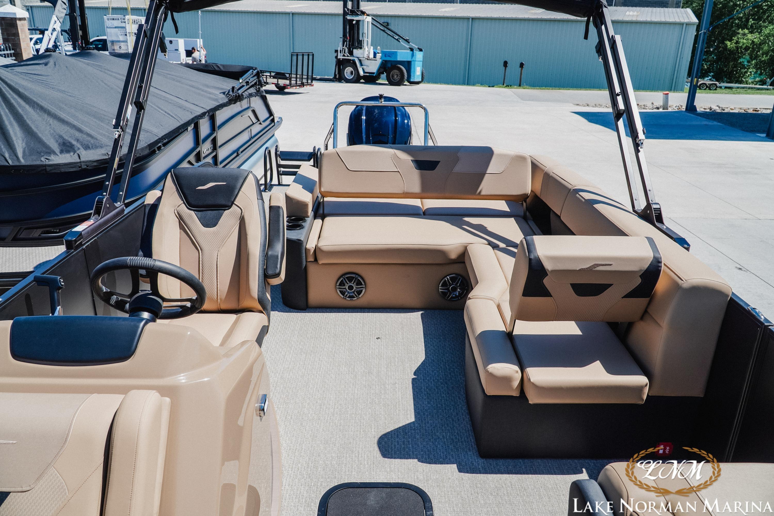 2026 Evotti 523CS boat interior with beige seating at Lake Norman Marina.