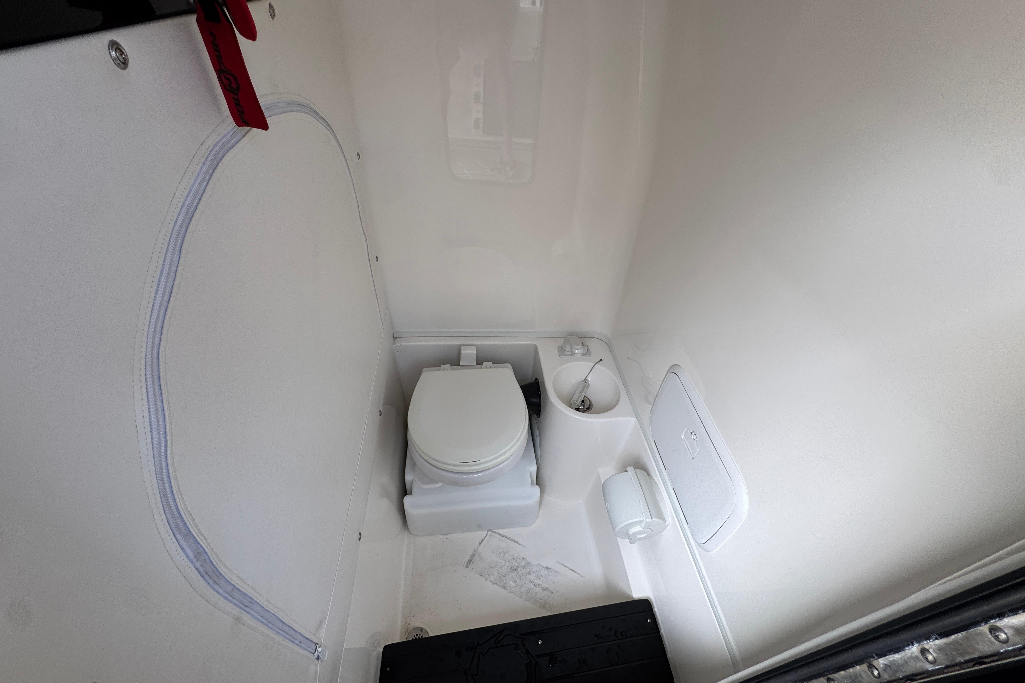 Compact marine toilet in 2023 Fountain 34 Tournament Edition boat.