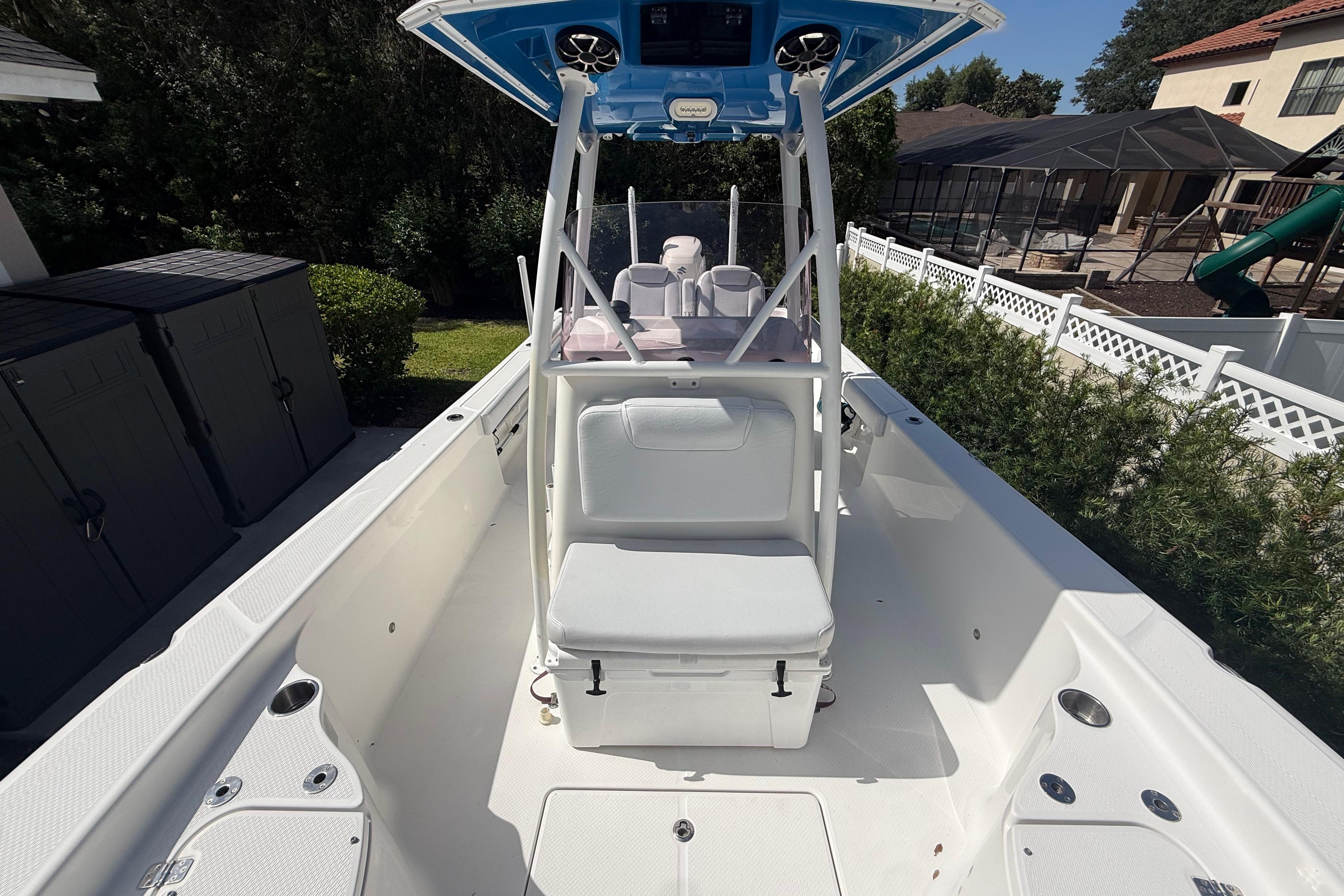 2019 Blue Wave 2800 Pure Hybrid boat, white interior, outdoor setting.