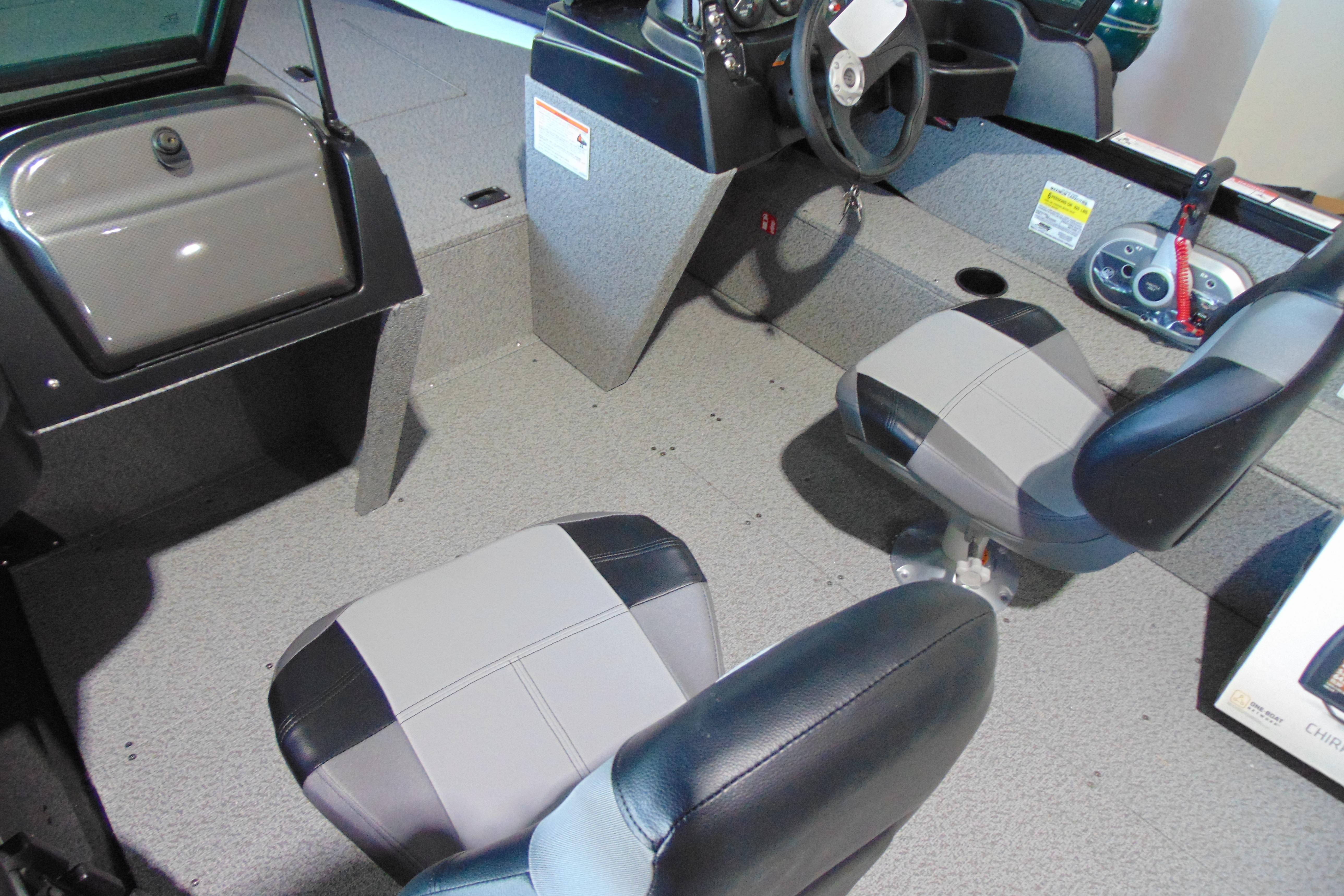 2026 Crestliner 1850 Kodiak WT boat interior with dual seats and steering console.