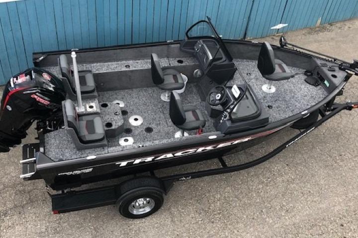2026 Tracker Pro Guide V-175 Combo boat on trailer, featuring spacious seating and modern design.