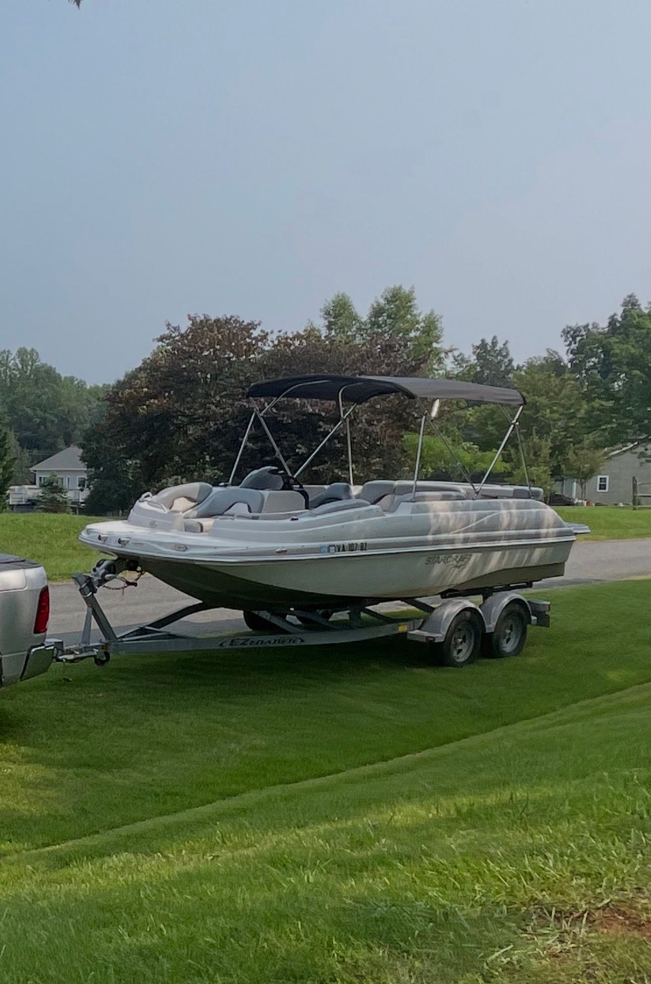 2015 Starcraft Star Step 220 I/O on trailer outdoors.