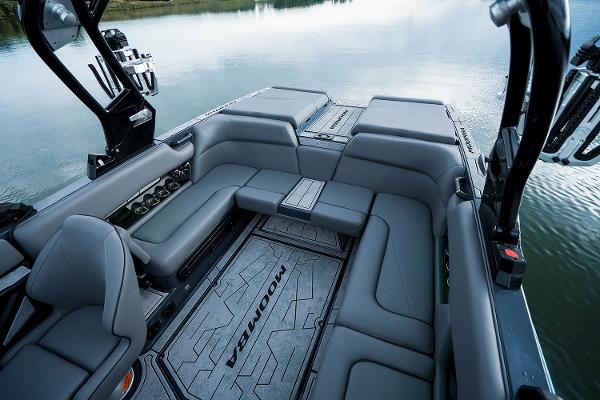 Manufacturer Provided Image: 2026 Moomba Craz boat interior with sleek gray seating and modern design on calm water.