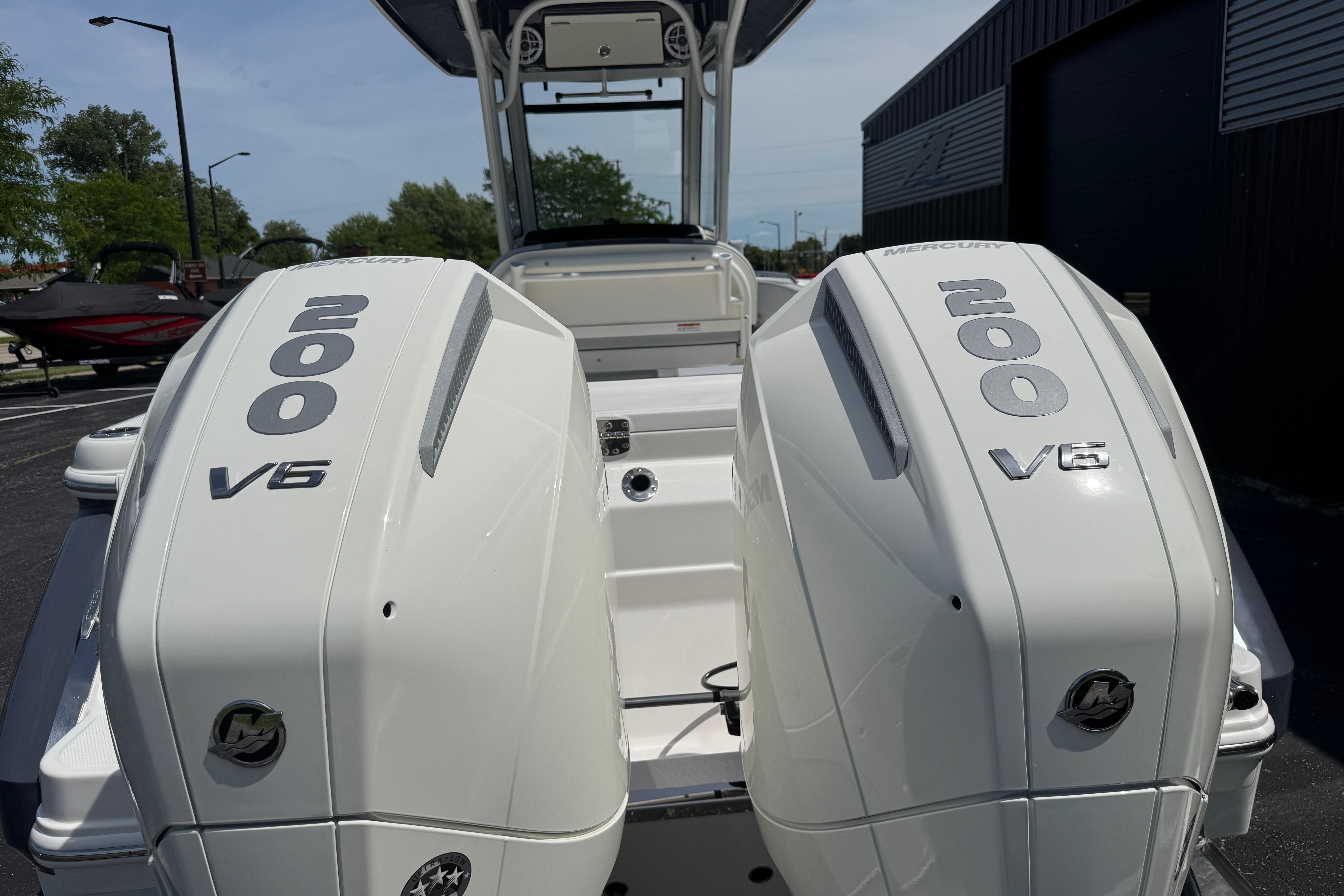 2026 Robalo R250 Center Console with twin Mercury 200 V6 engines.
