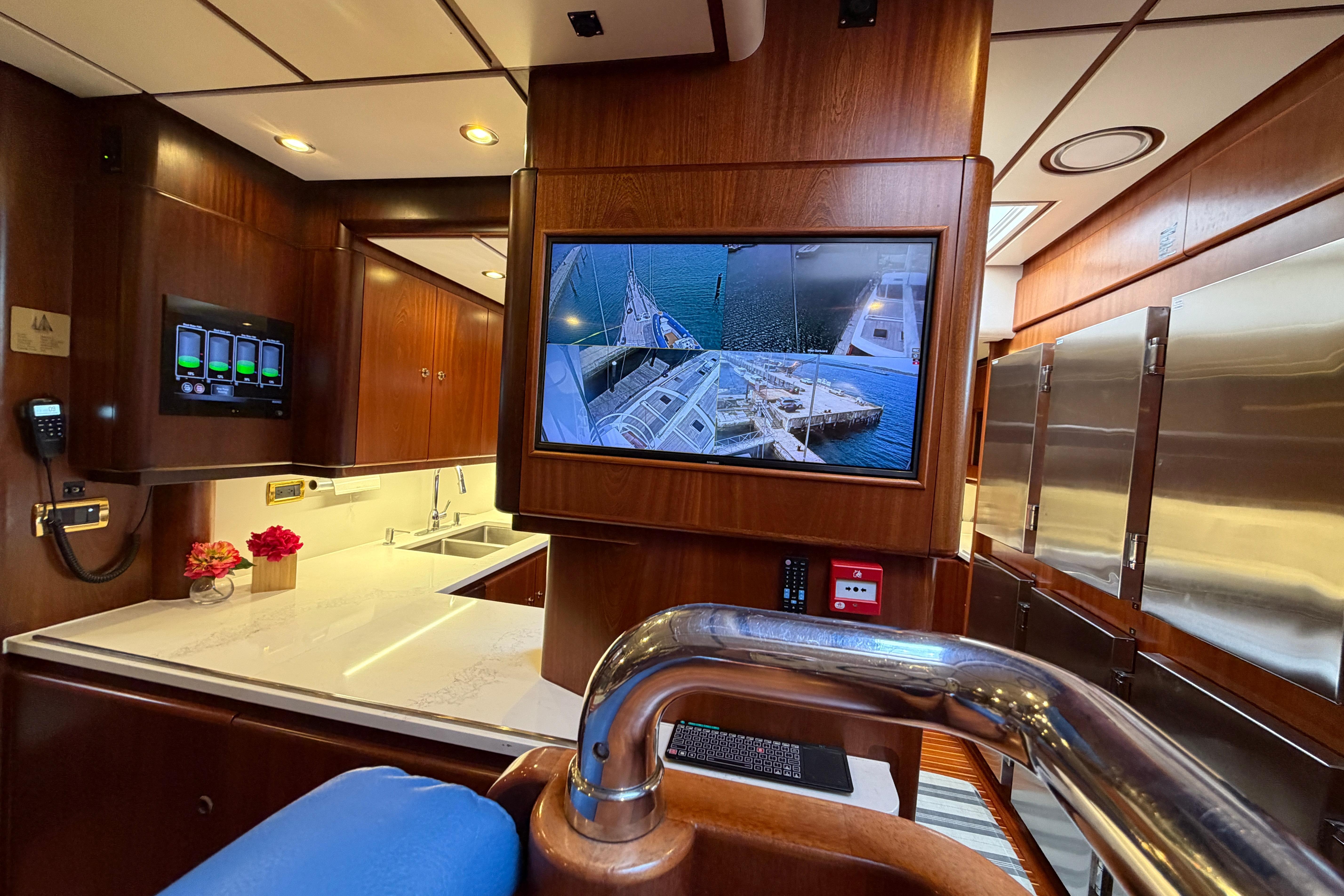 Luxurious interior of 2002 Jongert 40T yacht with modern amenities and wood finishes.
