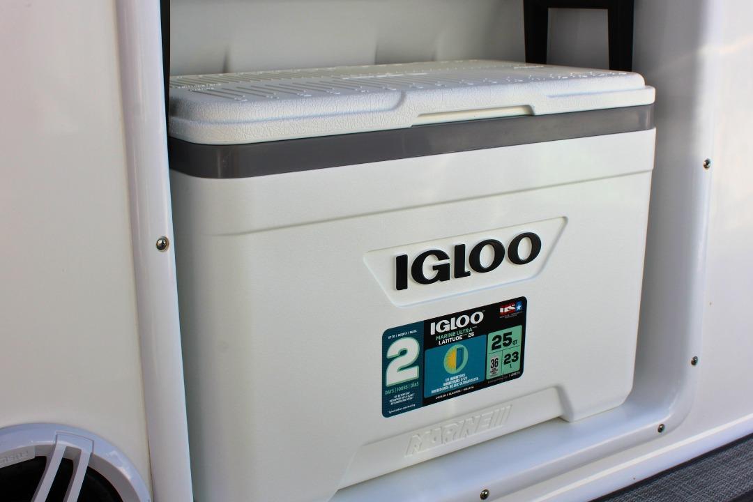 Igloo cooler on 2024 NauticStar 203 DC Deck boat, marine storage feature.