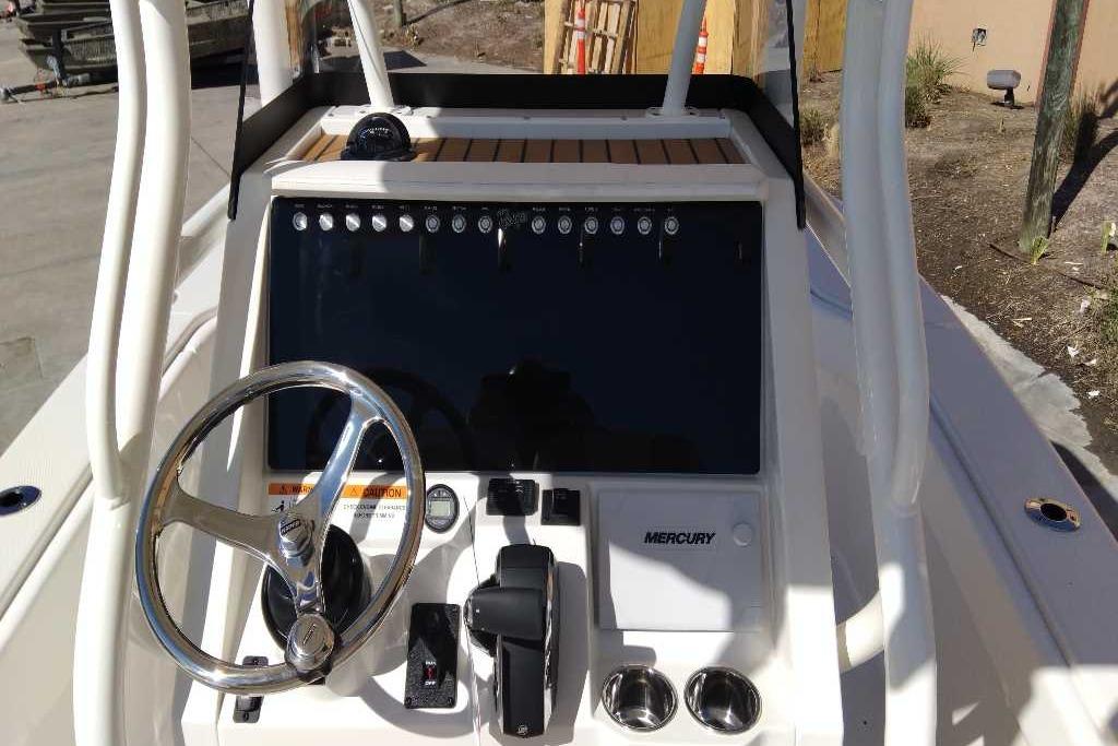 2026 Ranger 2600 Bay boat console with steering wheel and Mercury controls.