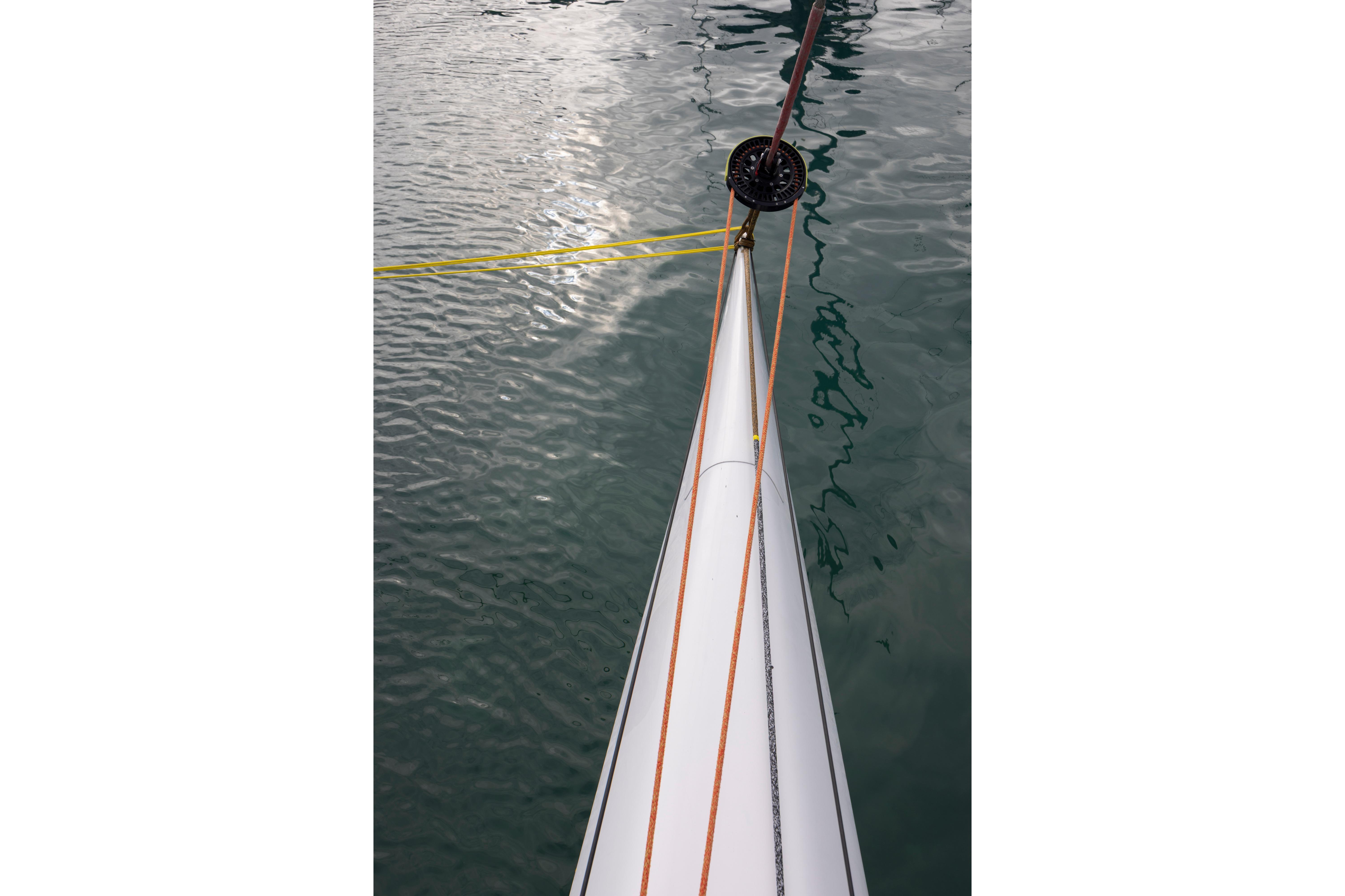 Bow of CDK Technologies MOD 70 sailboat on water, 2012 model.