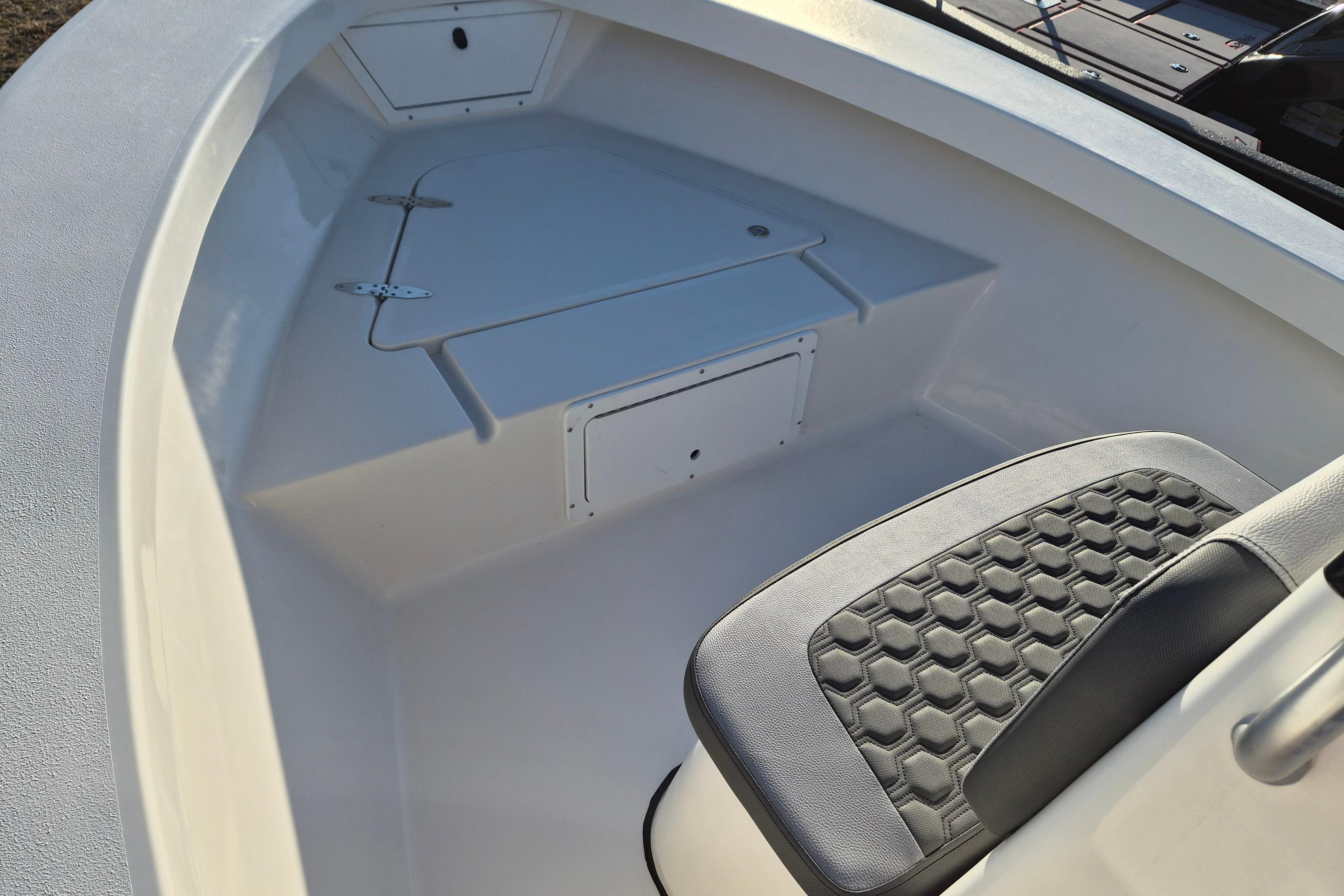 2026 May-Craft 192 boat interior with seating and storage compartments.