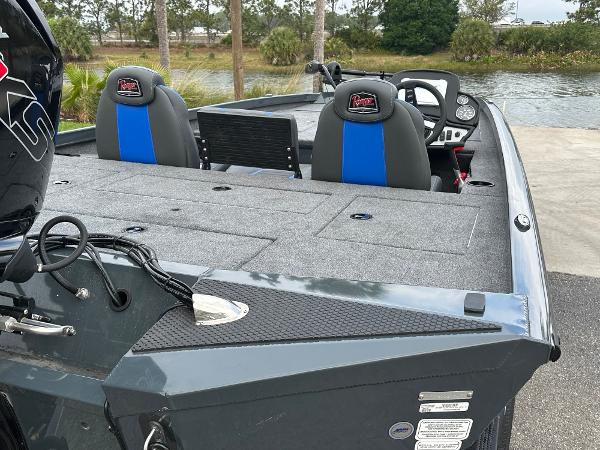 2025 Ranger RT188P fishing boat with dual seats, near a lake.