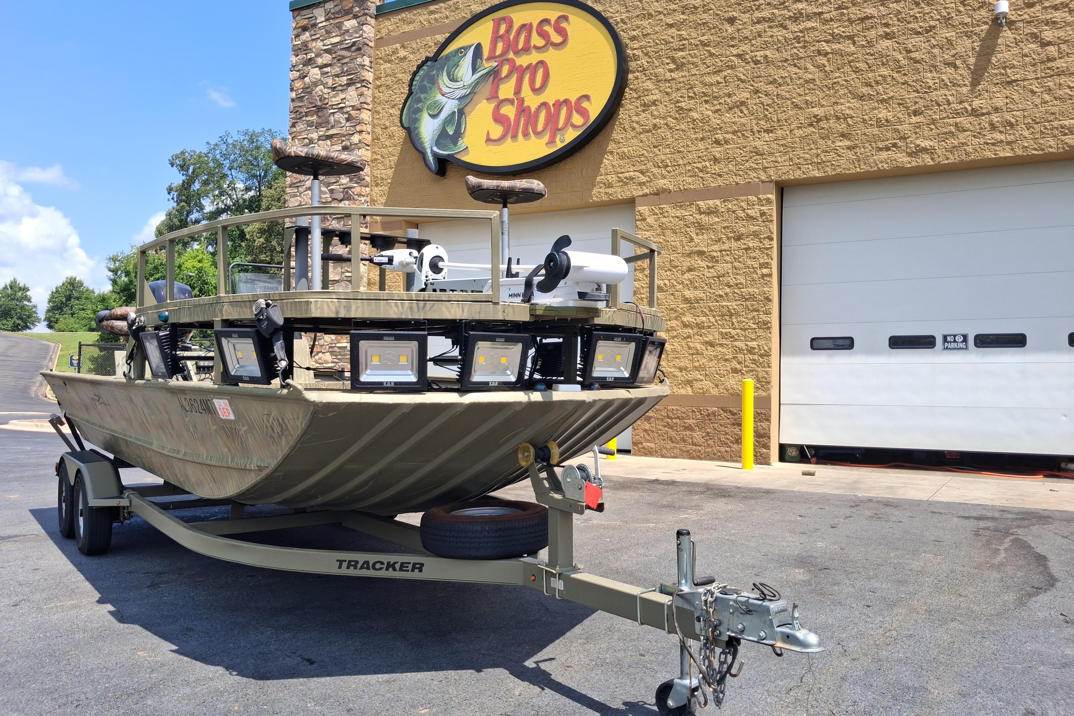 2016 Tracker Grizzly 2072 CC Sportsman boat outside Bass Pro Shops.