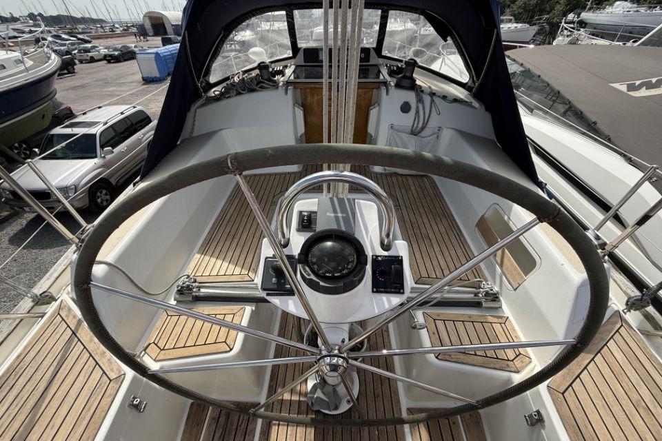 Cockpit of 2005 Southerly 35RS sailboat with steering wheel and compass.