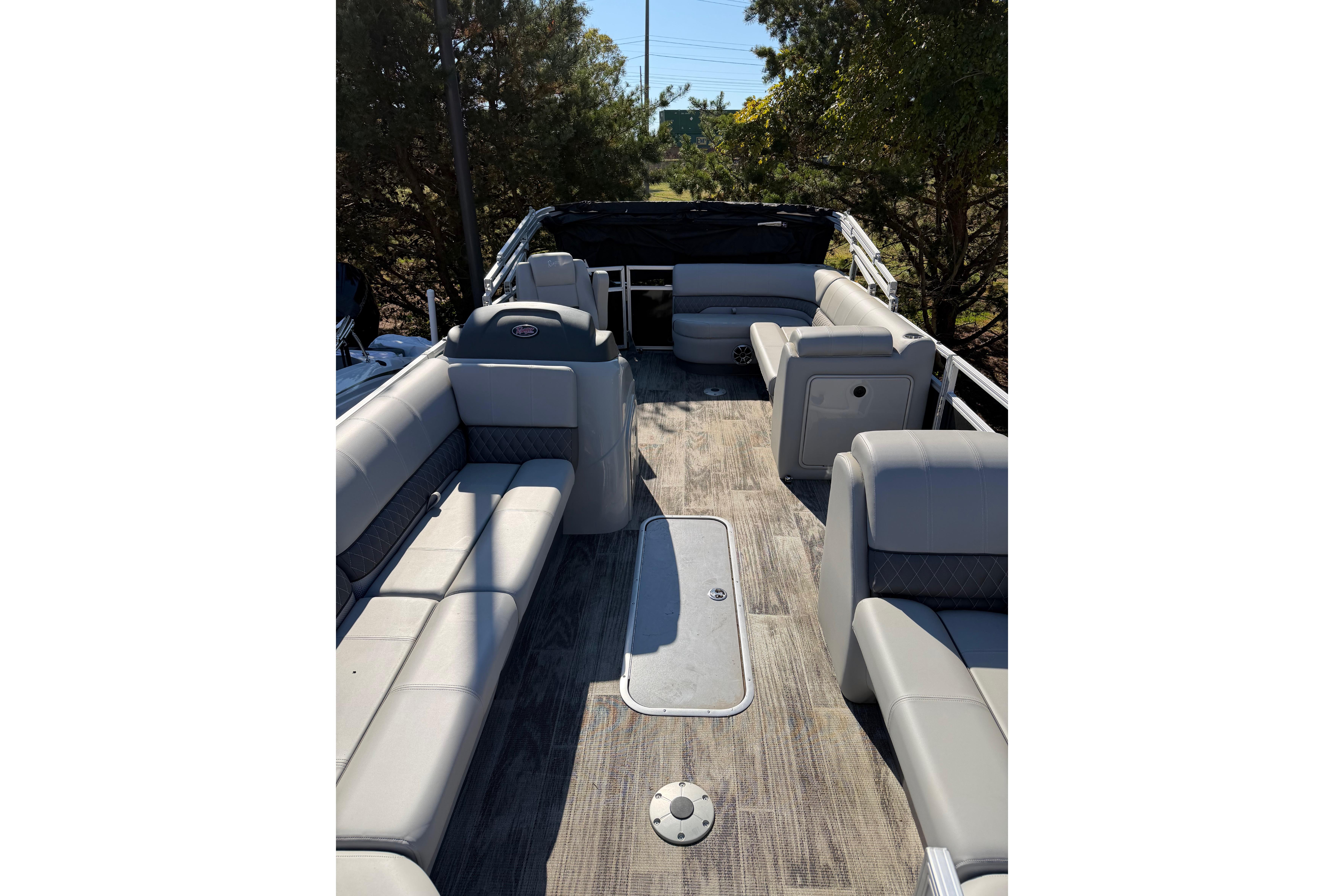 2024 Ranger Reata 223C pontoon boat interior with spacious seating and modern design.