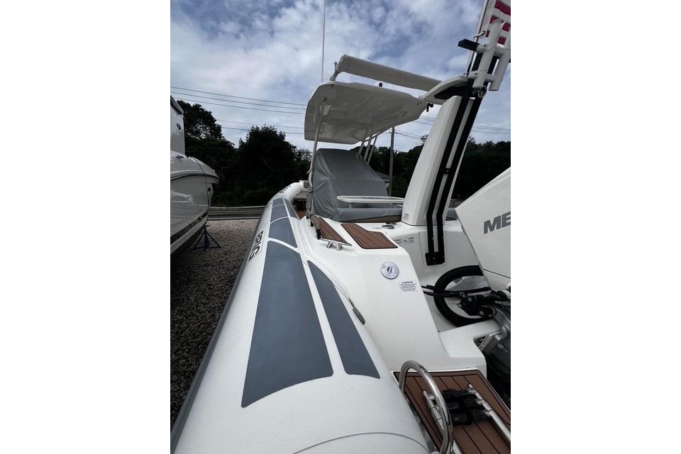 2022 Brig Eagle 8 boat with sleek design and modern features, docked outdoors.