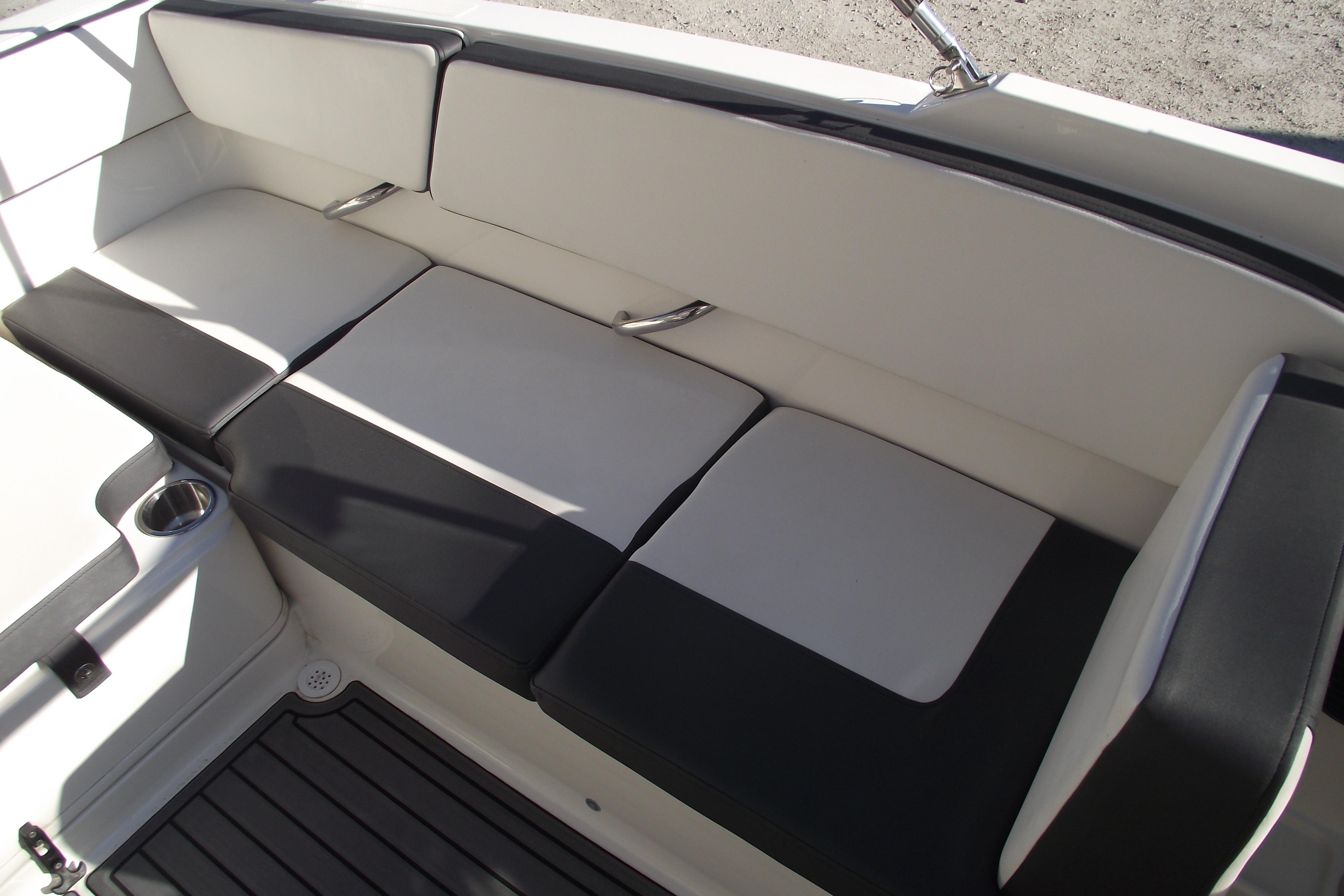 2022 Bayliner VR4 Bowrider OB interior seating with black and white cushions.