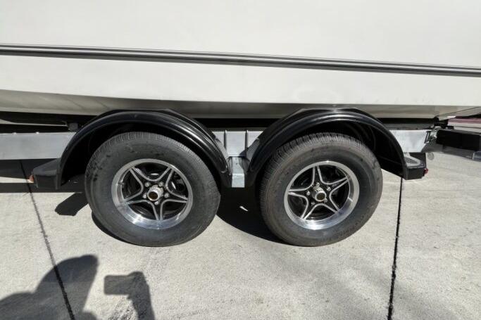 Trailer wheels of a 2025 Mako 214 Center Console boat.