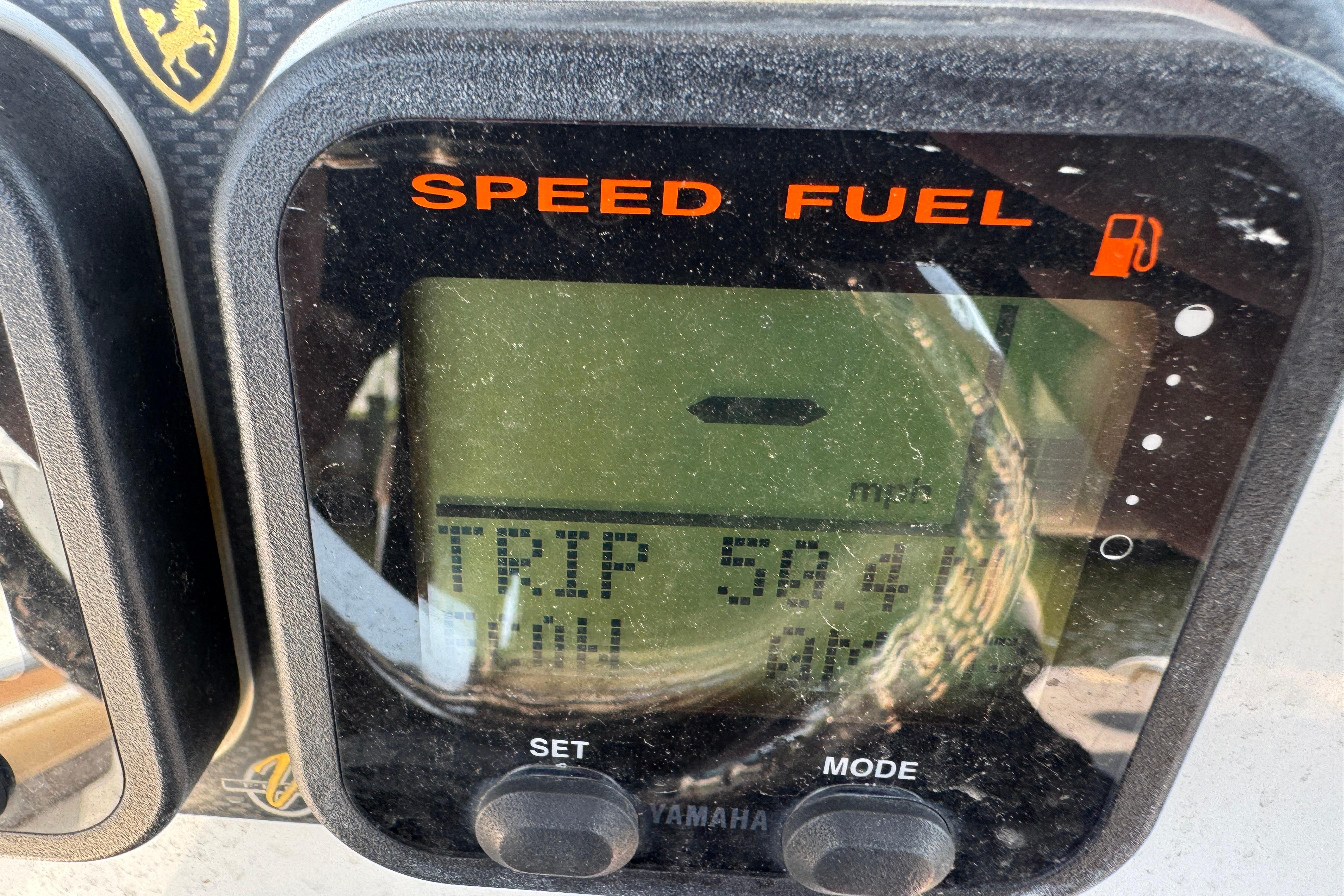 Close-up of a Yamaha speed and fuel gauge on a 2014 Century 2301 Center Console boat.