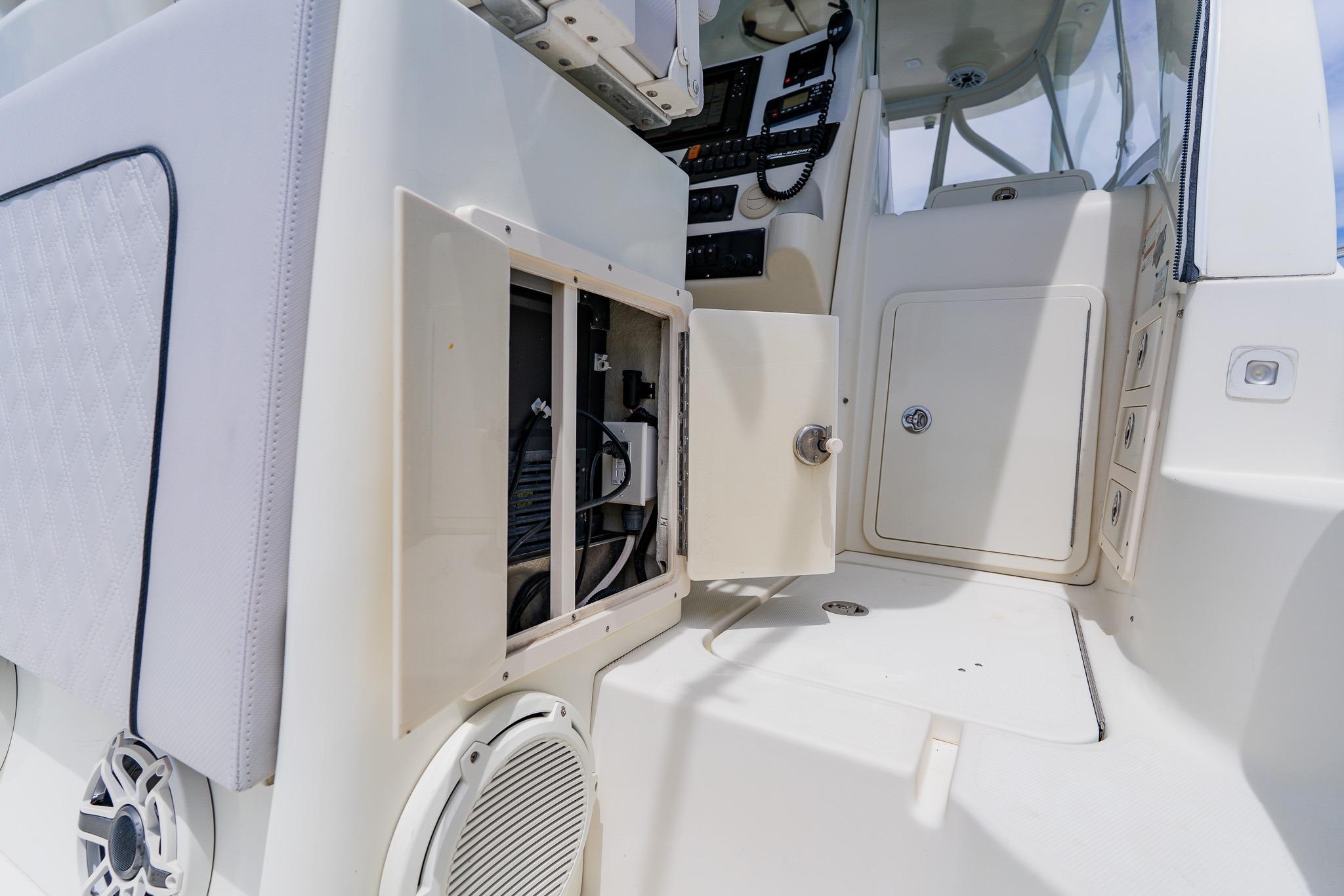 2008 Hydra-Sports Vector 3500 VX boat interior with open storage compartment.