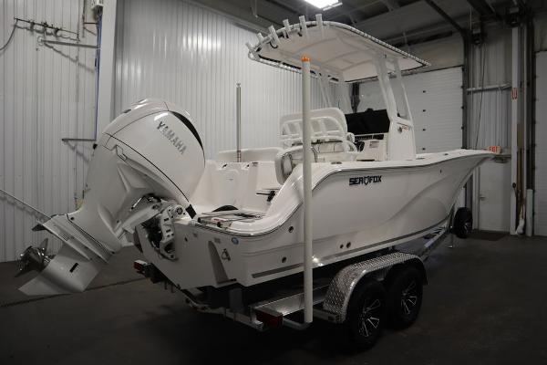 2025 Sea Fox 228 Commander boat with Yamaha engine in a garage setting.