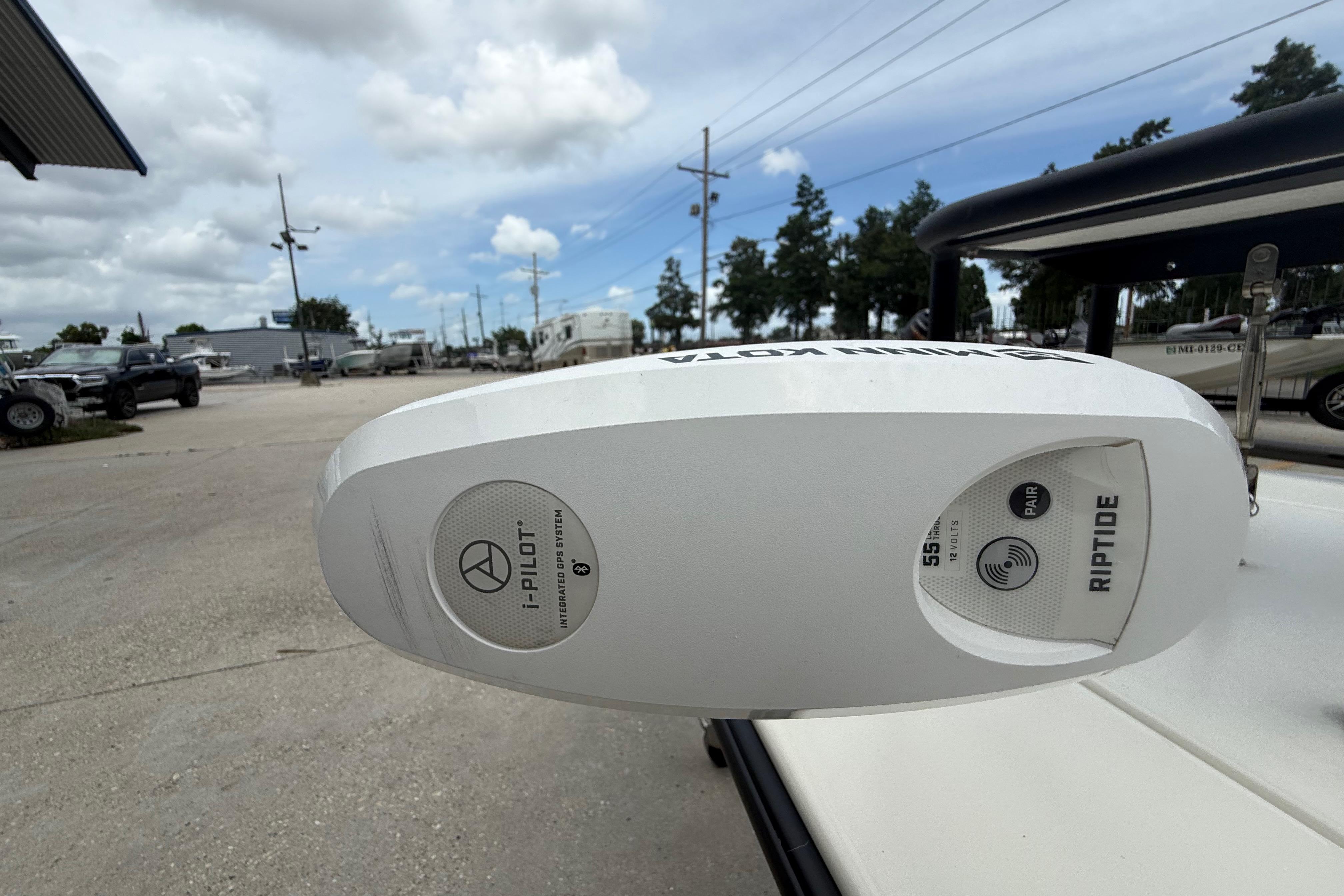 Minn Kota Riptide motor on 2020 Skimmer Skiff 14 boat, outdoor setting.