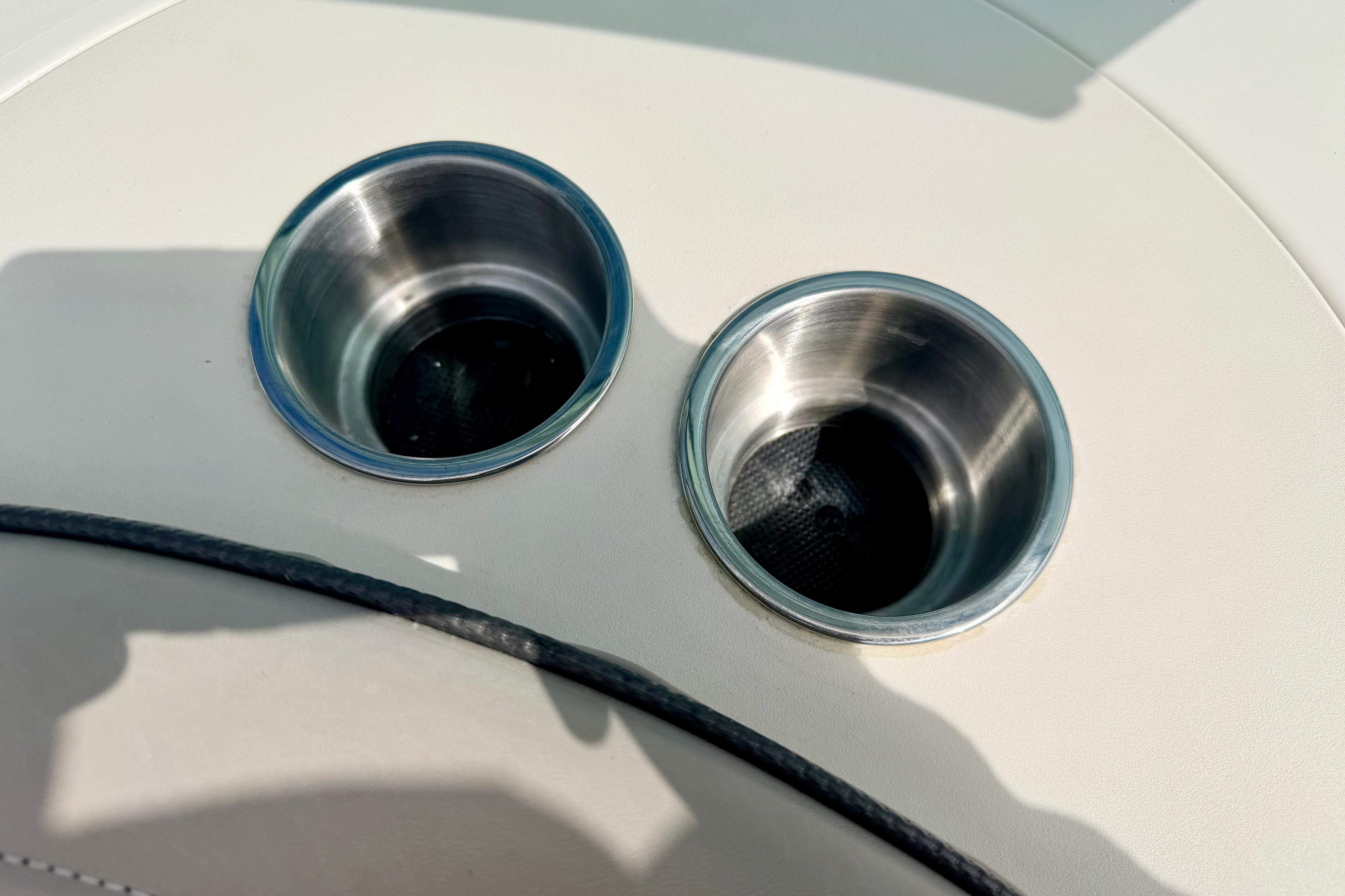 Stainless steel cup holders on 2003 Sea Ray 200 Sundeck boat.