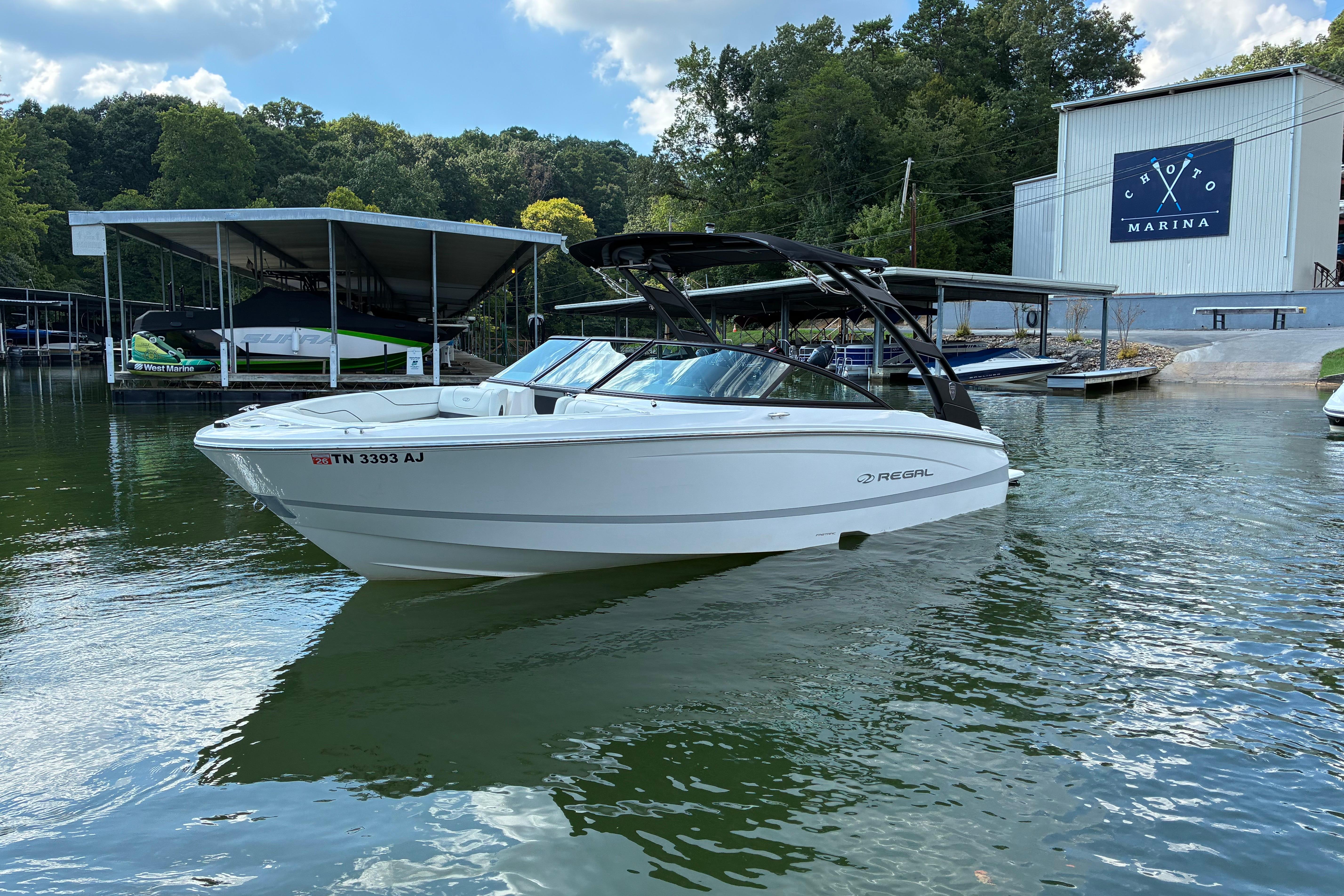 2025 Regal LS2 boat docked at Choto Marina on a sunny day.