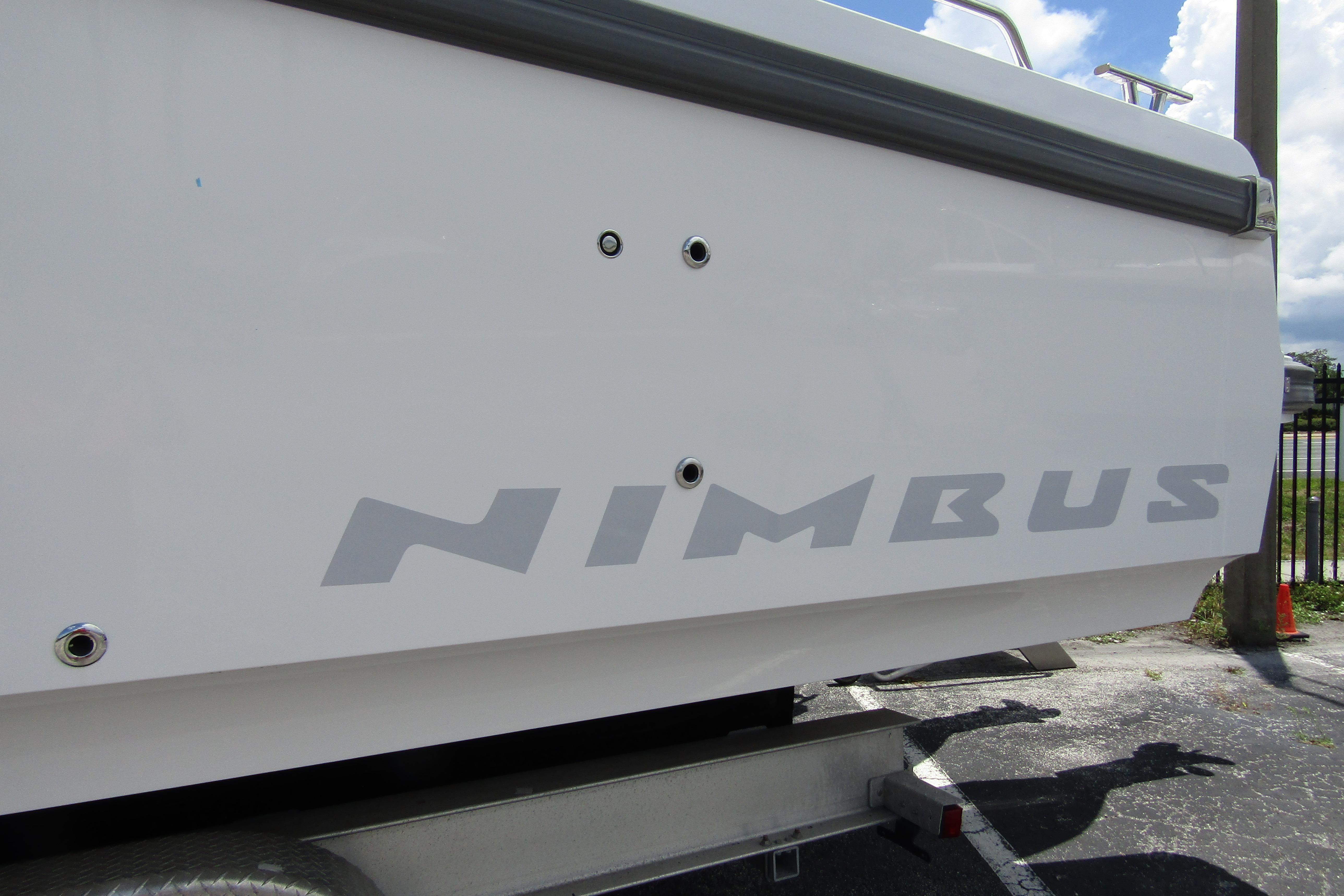 Side view of a 2025 Nimbus Tender 11 boat with logo visible.
