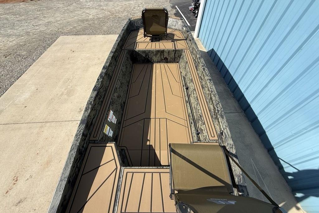 2026 Tracker Grizzly 1650 T Prairie Wings Edition boat with camo design and spacious interior.
