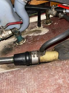Plumbing and hoses in a 2000 Beneteau Oceanis 311 sailboat.