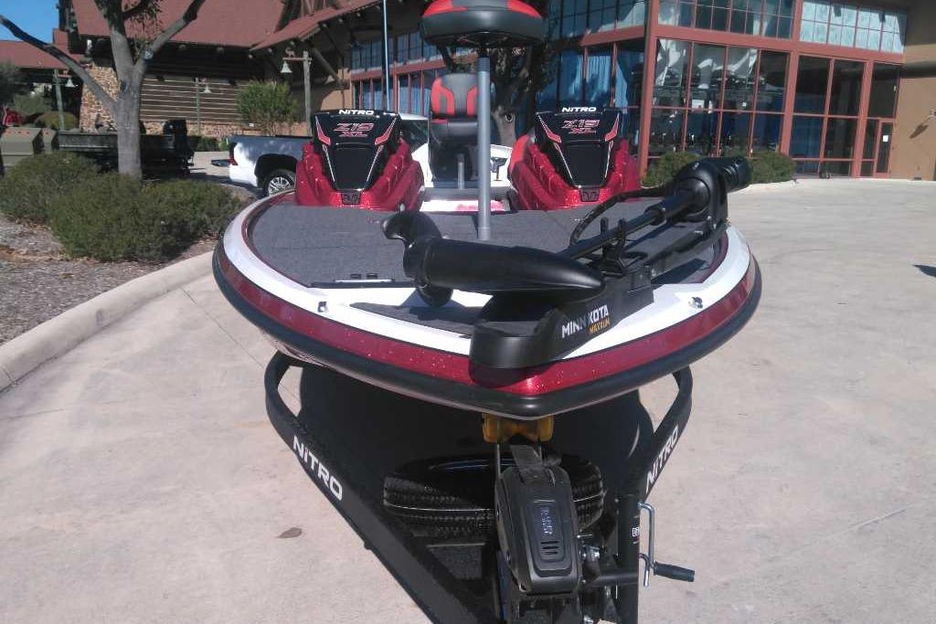2026 Nitro Z19 XL boat with Minn Kota motor, parked outdoors.