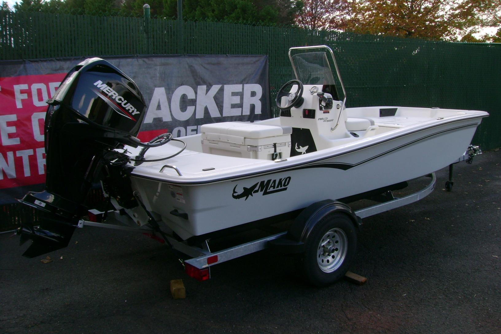2026 Mako Pro Skiff 15 CC boat with Mercury engine on trailer.