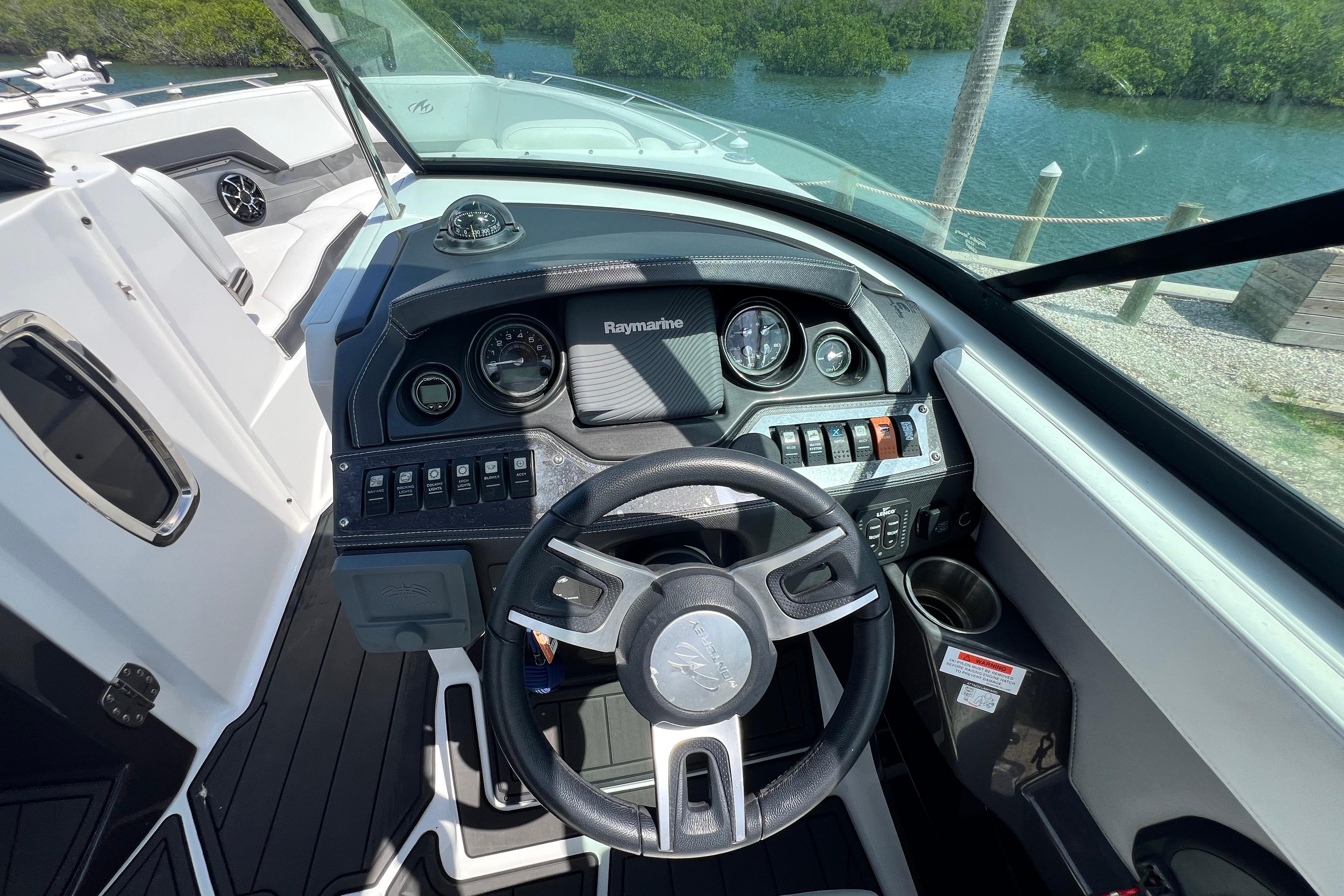 Cockpit view of a 2015 Monterey 268SS Super Sport boat with steering wheel and dashboard.
