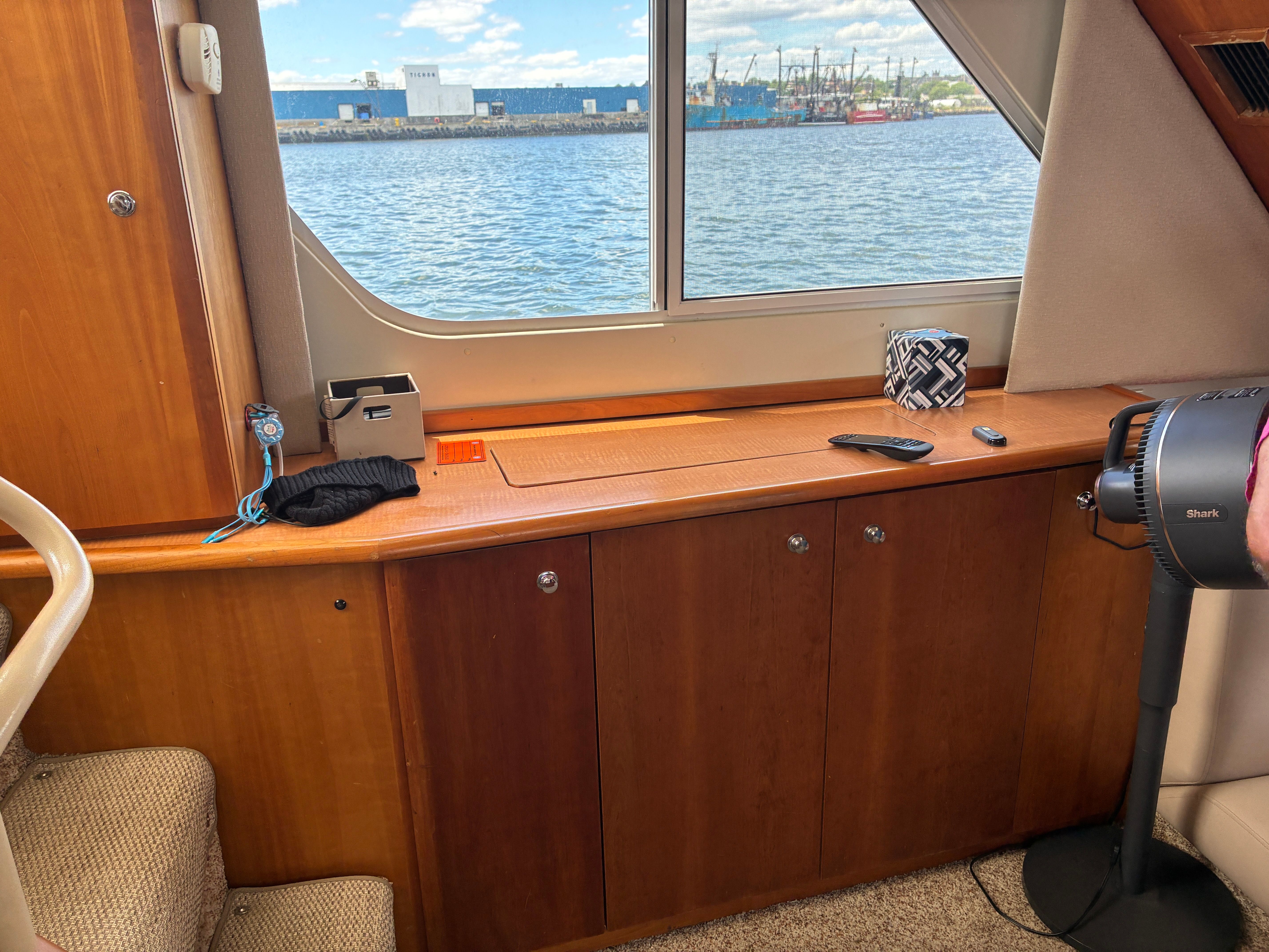Interior of a 2001 Silverton 392 Motor Yacht with a view of the water.