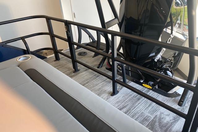 2026 Bentley Pontoons Legacy 243 Swingback interior with railing and engine view.