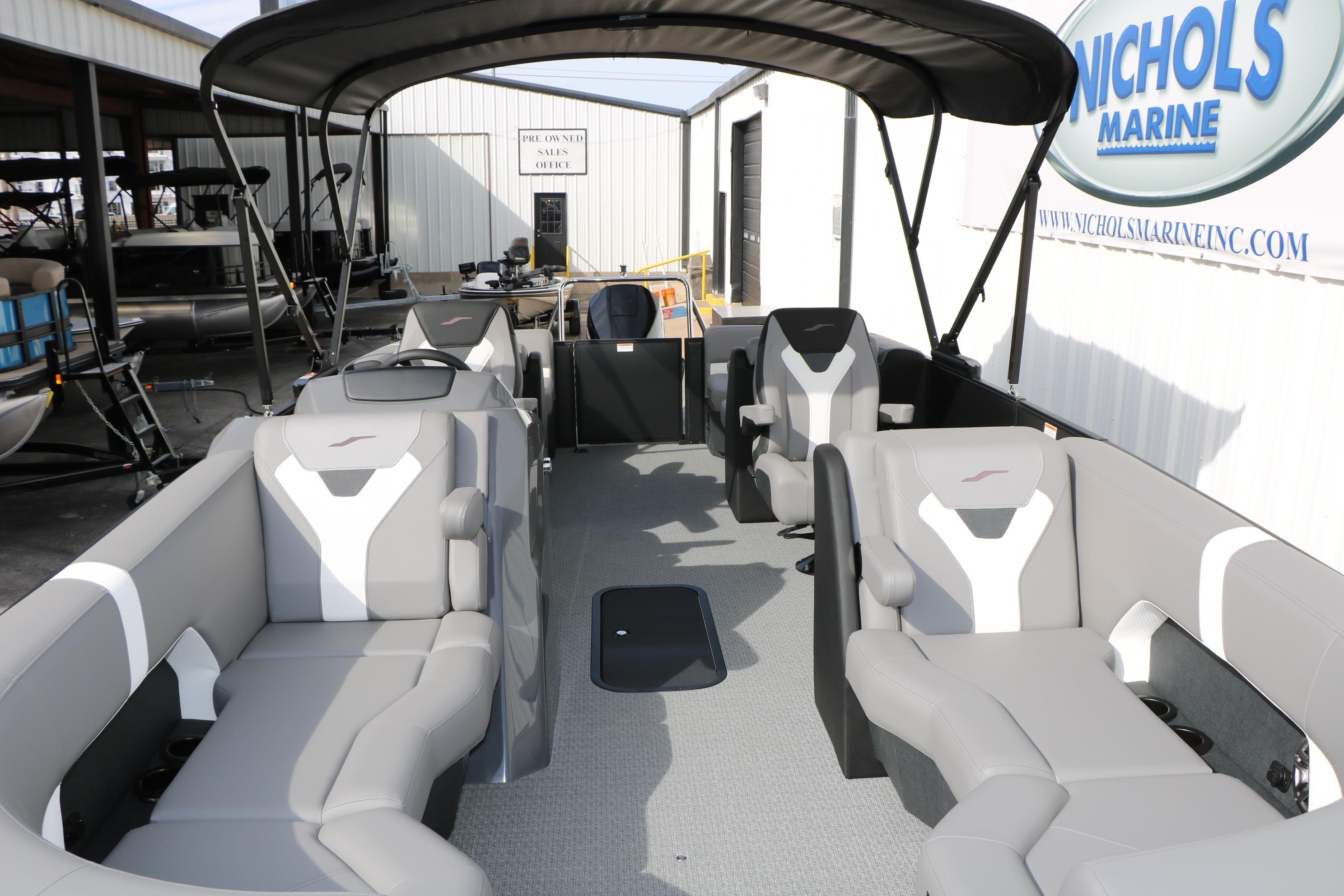 2026 Evotti 521QL pontoon boat with spacious seating at Nichols Marine dealership.