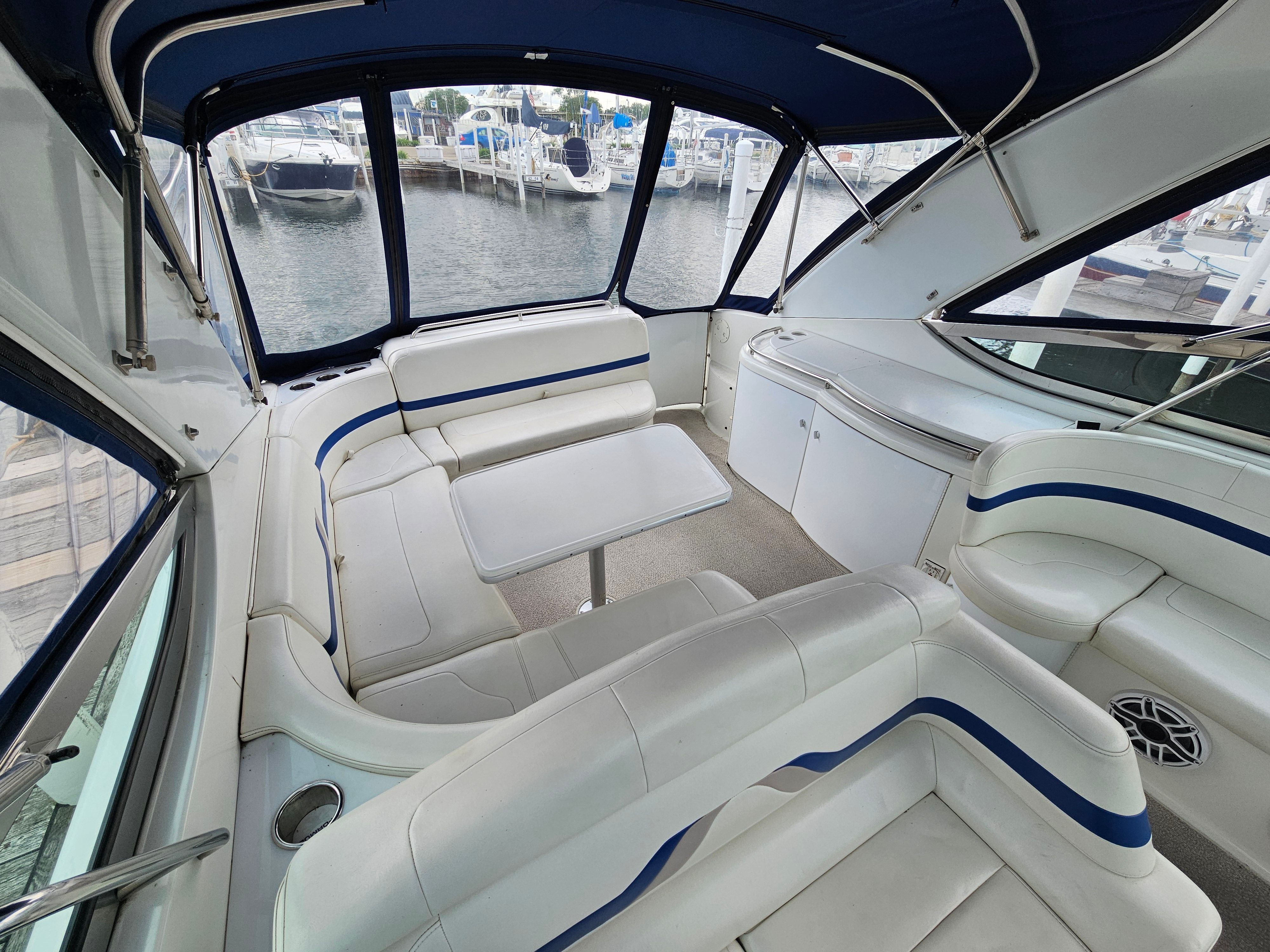 Interior of a 2001 Formula 400 Super Sport with white seating and blue accents.