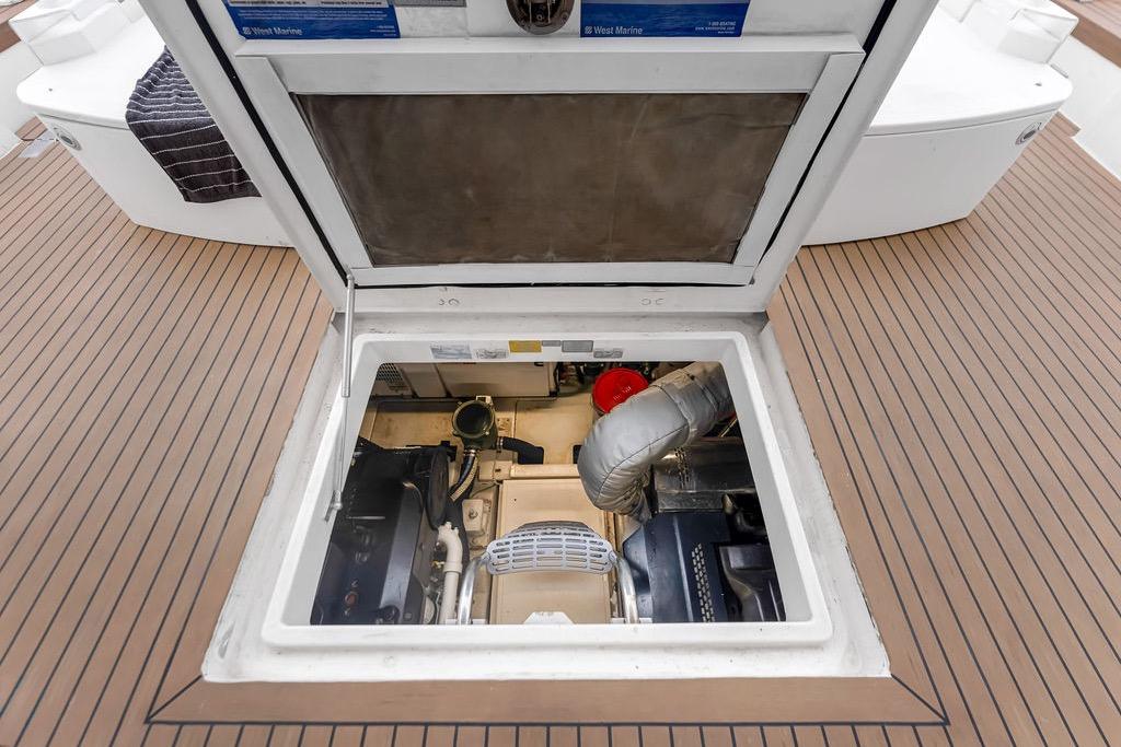 Engine compartment of 2012 Fairline Targa 58 yacht, showcasing mechanical components.