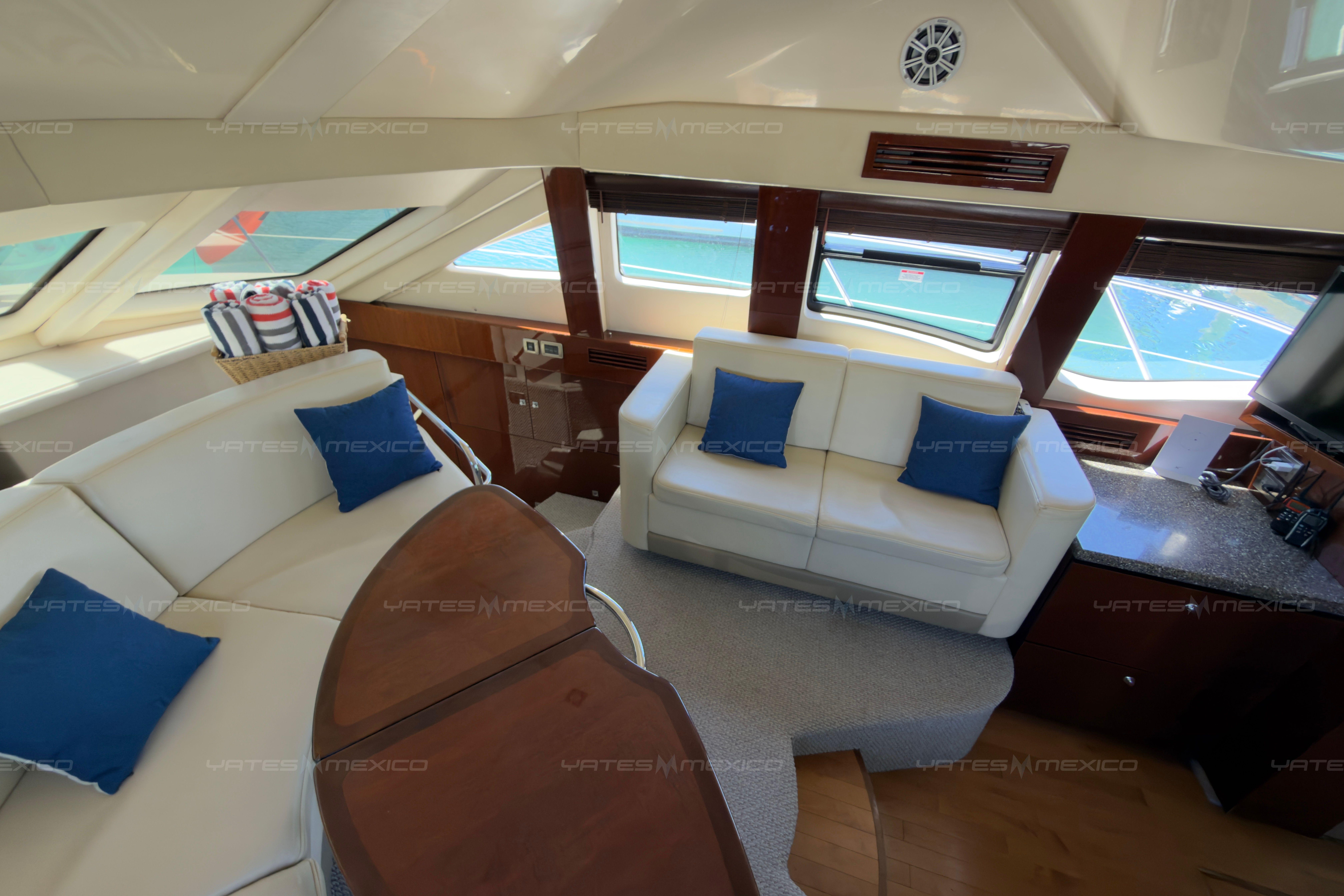 Luxurious interior of 2008 Sea Ray 480 Sedan Bridge yacht with plush seating and elegant decor.
