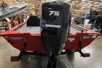2026 Tracker Pro Team 175 boat with Mercury 75 engine in showroom.